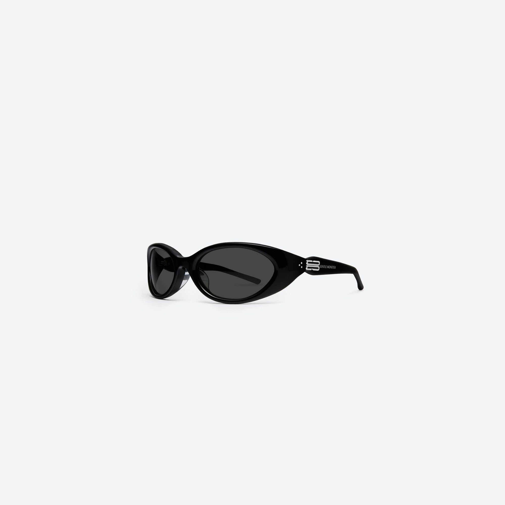 45-degree view of Gentle Monster Atempo 01 Black Acetate framed Wraparound sunglasses.