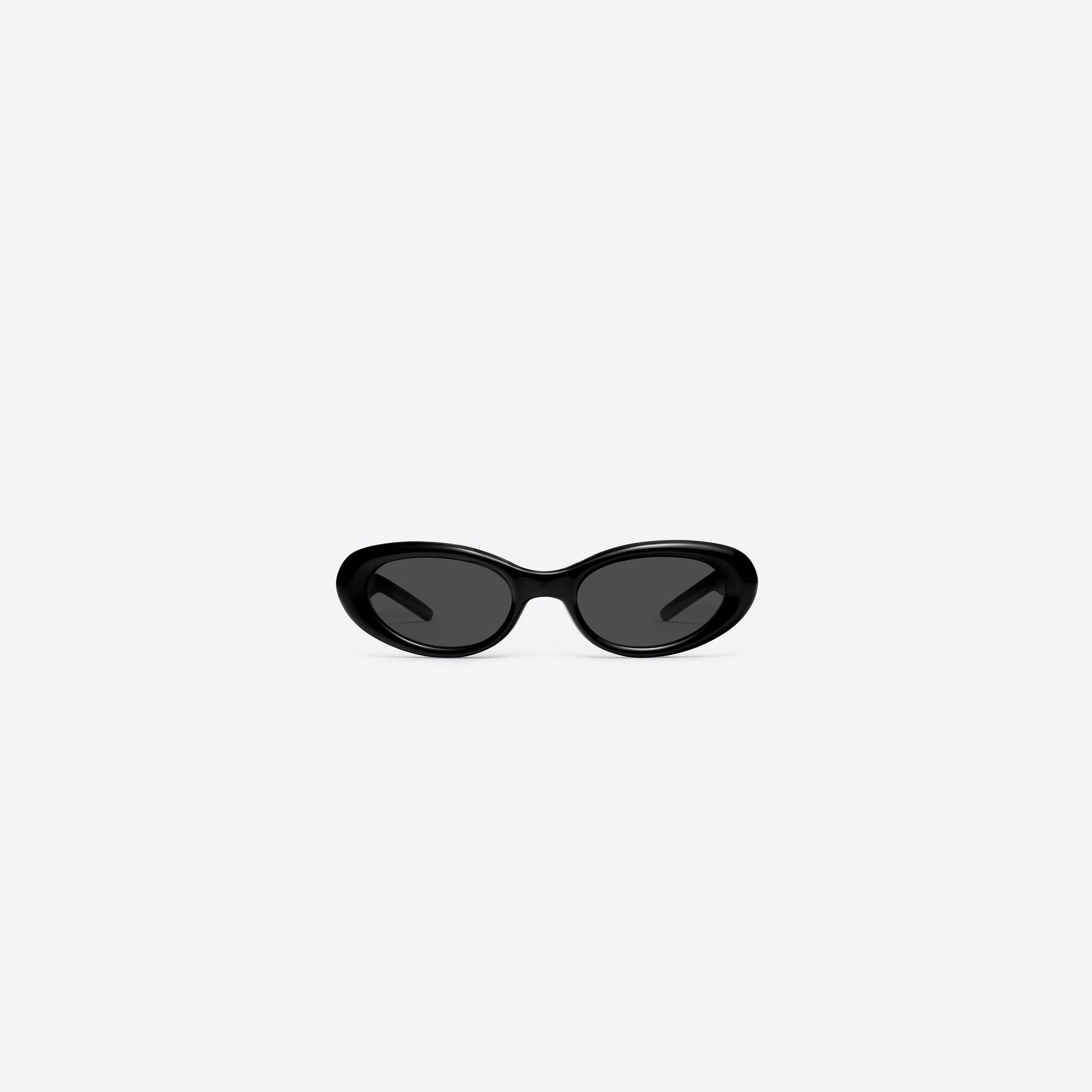 A front view of Gentle Monster Cuff 01 Black Acetate framed Oval sunglasses.