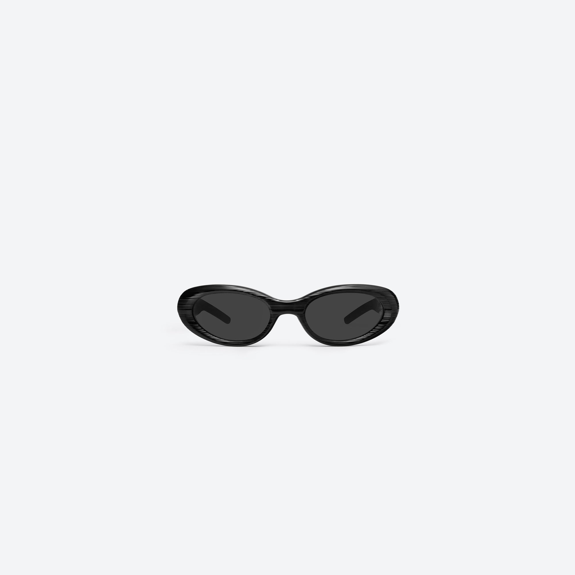 A front view of Gentle Monster Cuff S01 Similar Black Acetate framed Oval sunglasses.
