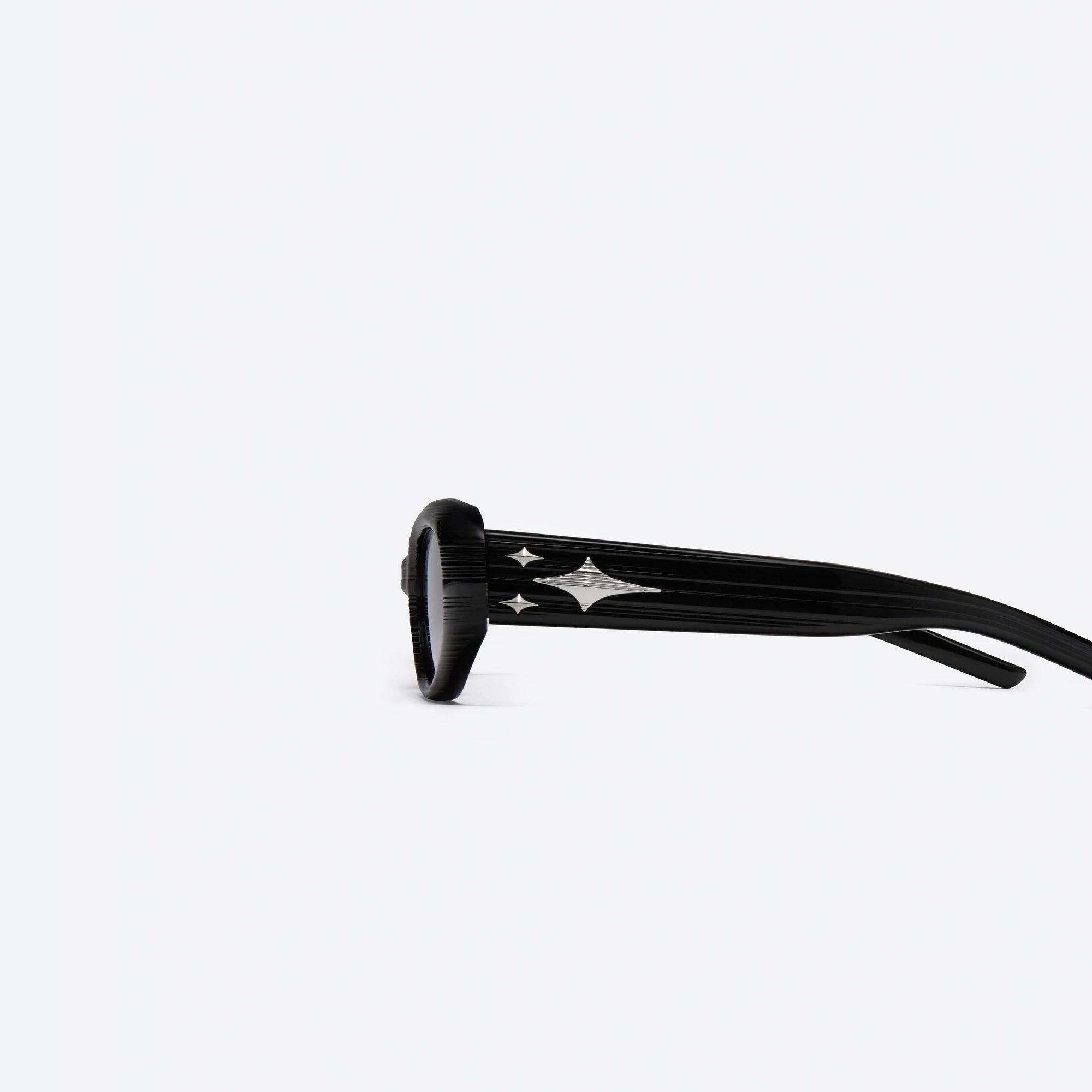 A detailed left view of Gentle Monster Cuff S01 Similar Black Acetate framed Oval sunglasses.