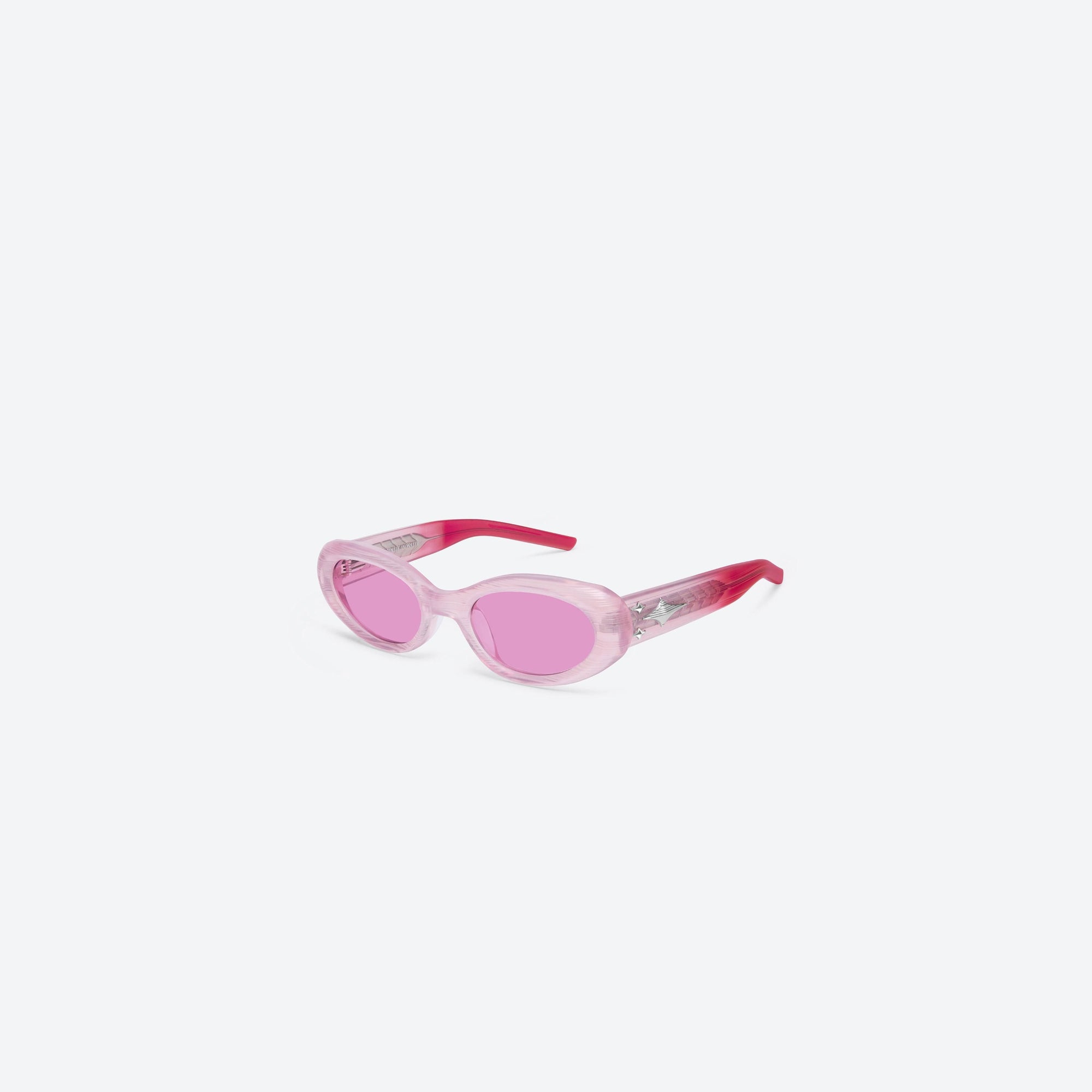45-degree view of Gentle Monster Cuff SPC9 Pink Acetate framed Oval sunglasses.