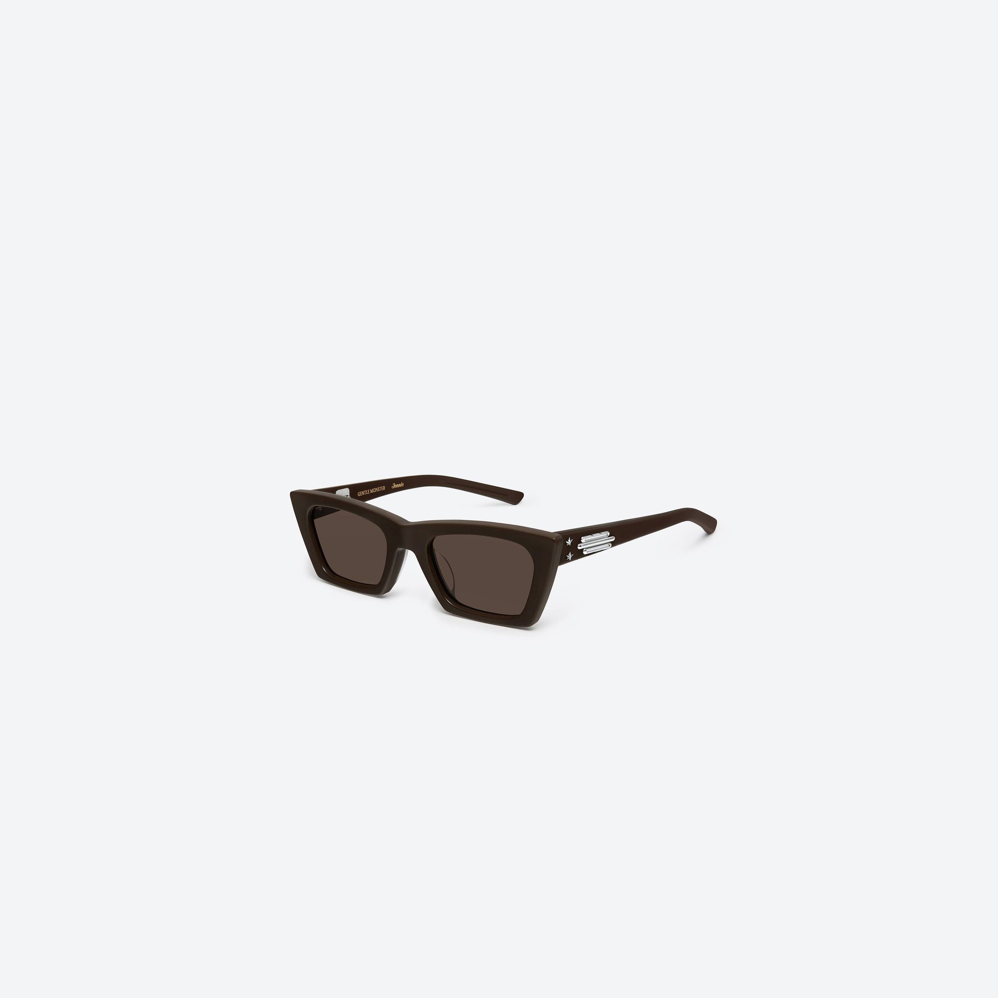 45-degree view of Gentle Monster Jennie - Baby Pony BR3 Brown Acetate framed Cat-eye sunglasses.