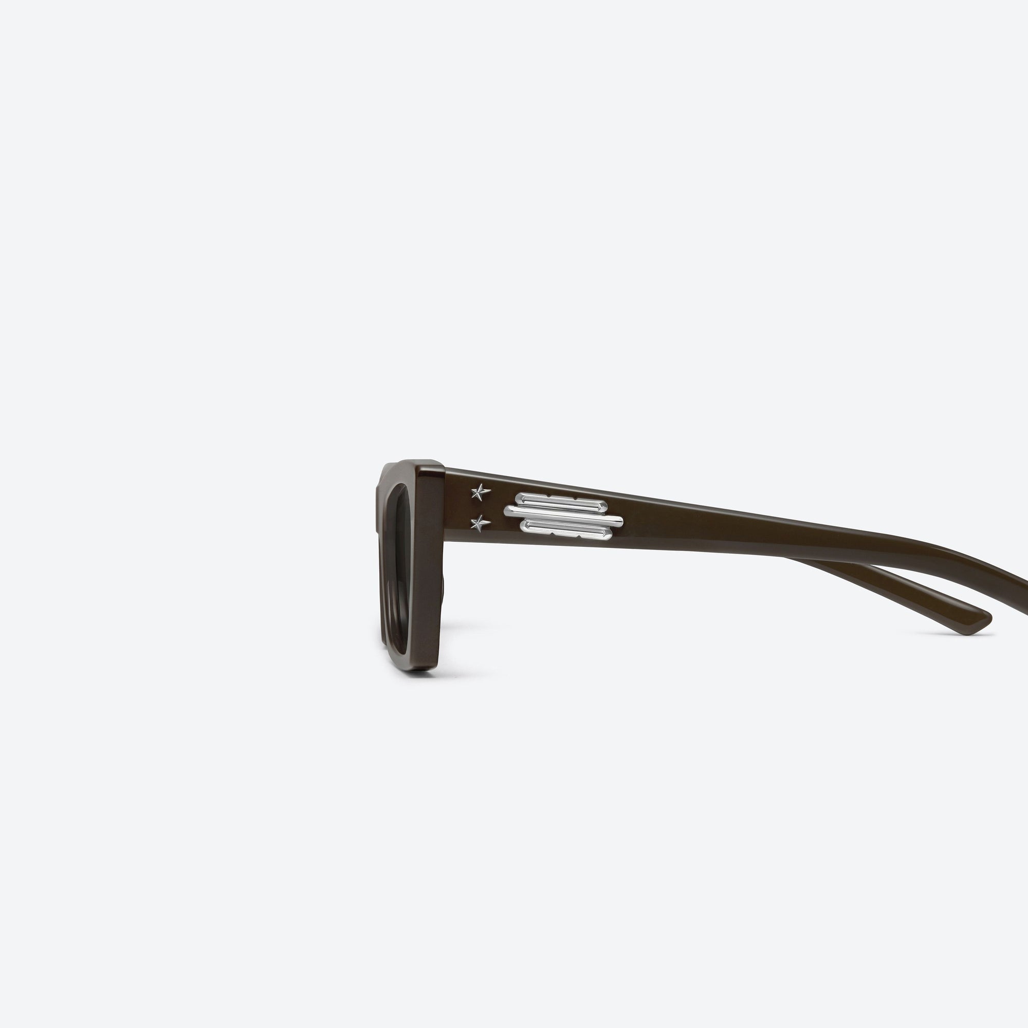 A detailed left view of Gentle Monster Jennie - Baby Pony BR3 Brown Acetate framed Cat-eye sunglasses.