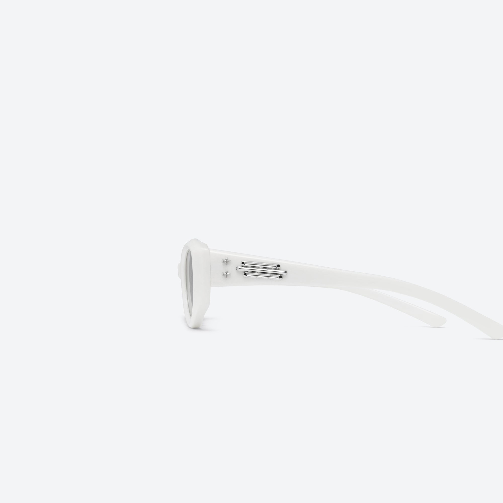 A detailed left view of Gentle Monster Jennie - Fish Tail W2 White Acetate framed Cat-eye sunglasses.