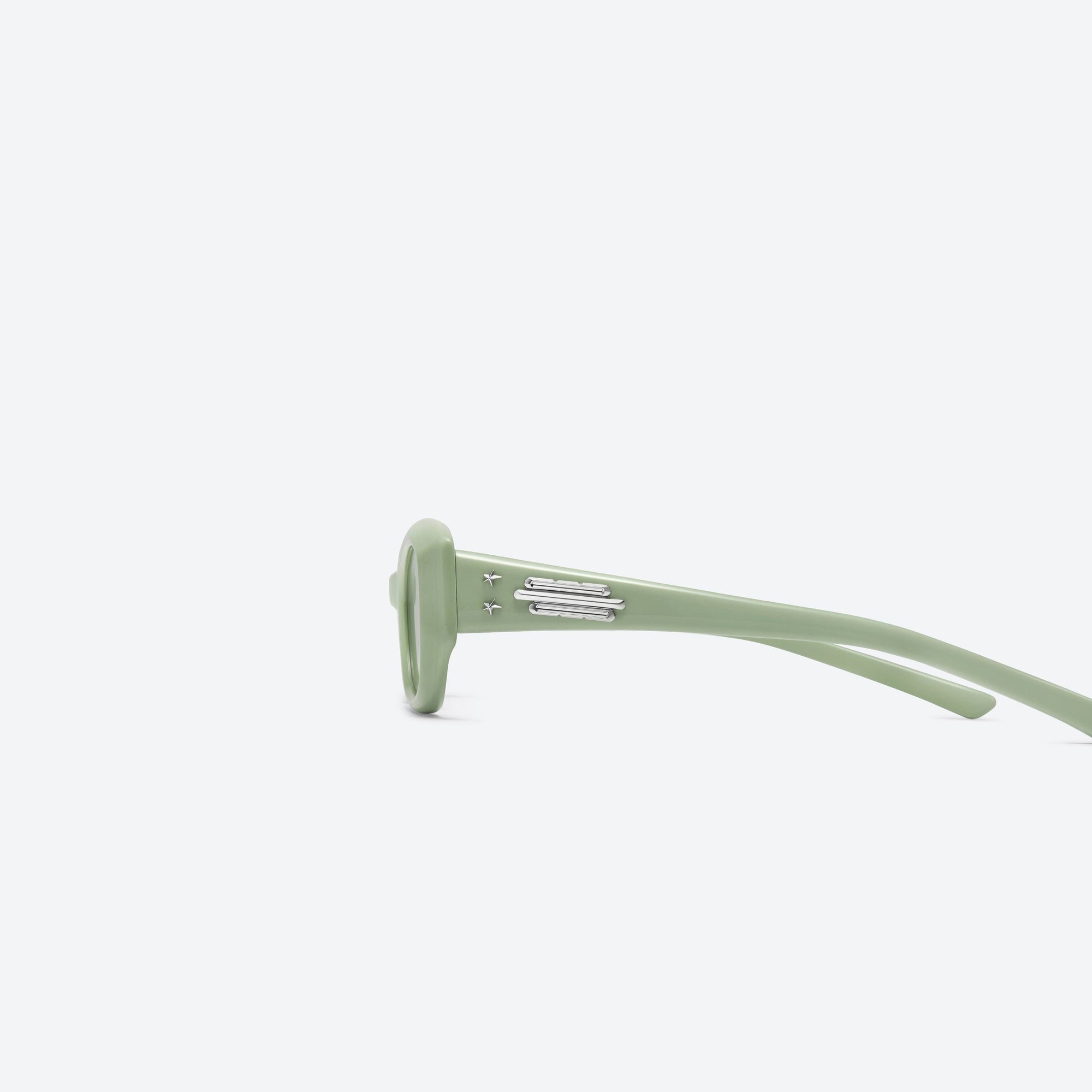 A detailed left view of Gentle Monster Jennie - Wispy GR8 Green Acetate framed Square sunglasses.