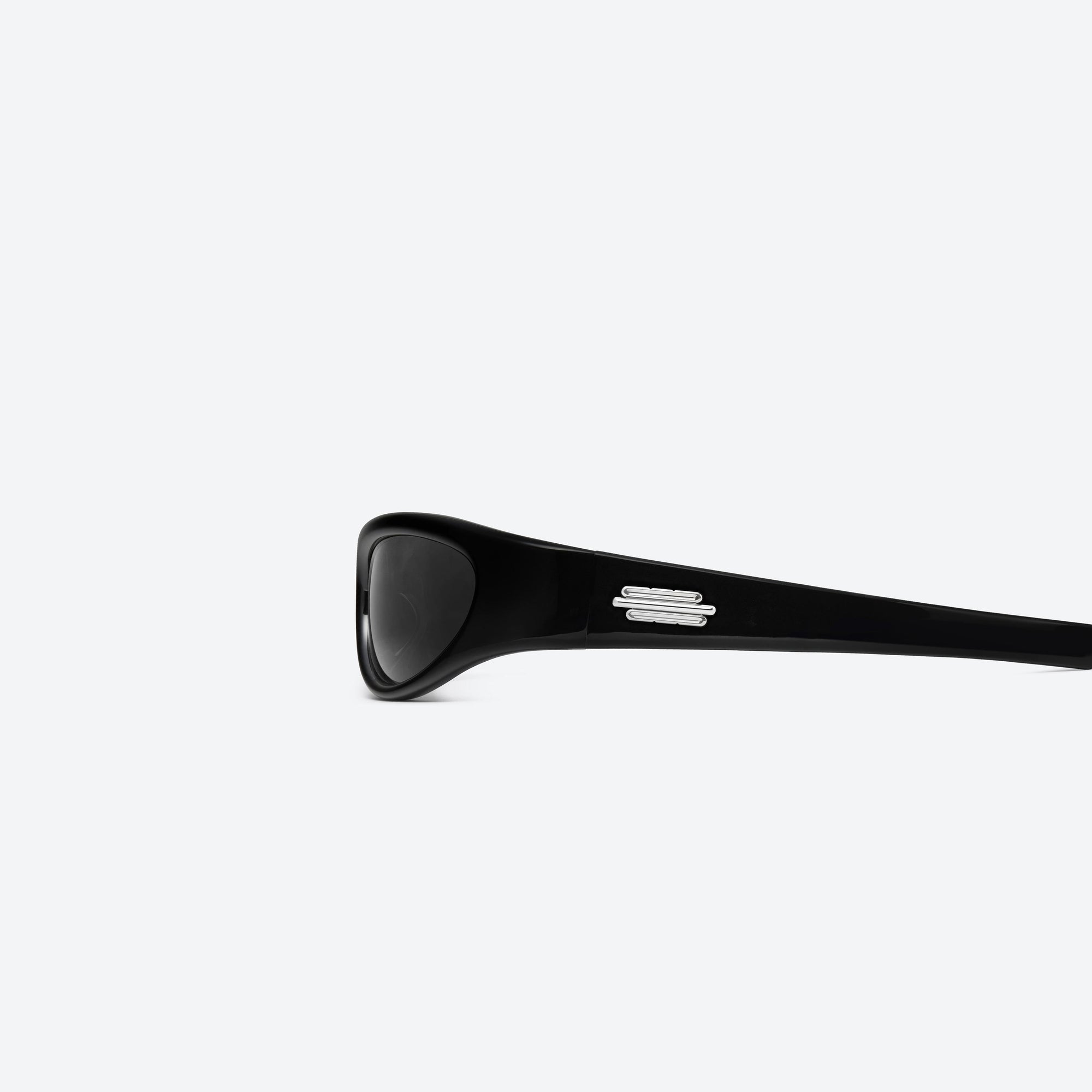 A detailed left view of Gentle Monster Jennie - Cheveux De Nini 01 Black Acetate framed Wraparound sunglasses.