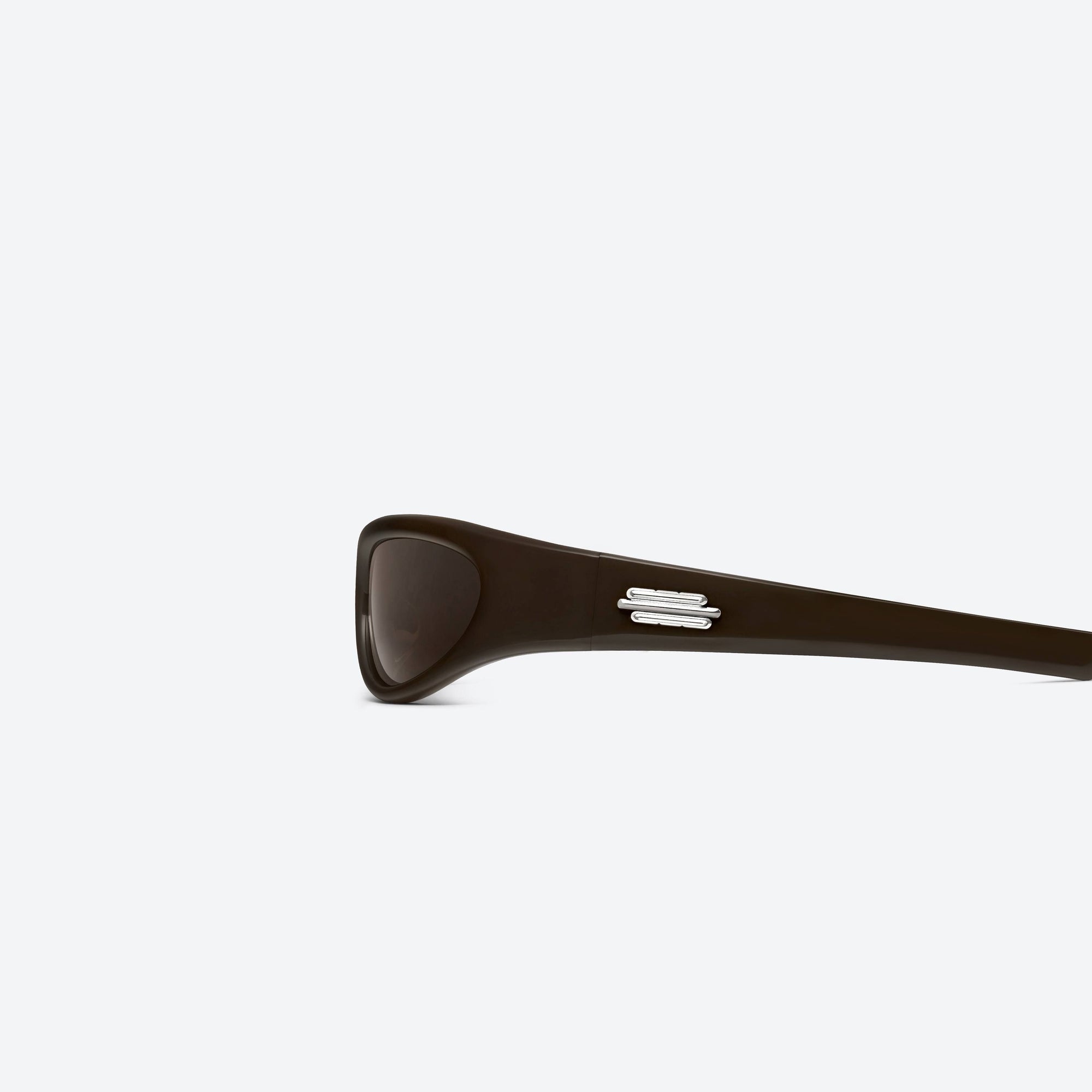A detailed left view of Gentle Monster Jennie - Cheveux De Nini BR3 Brown Acetate framed Wraparound sunglasses.