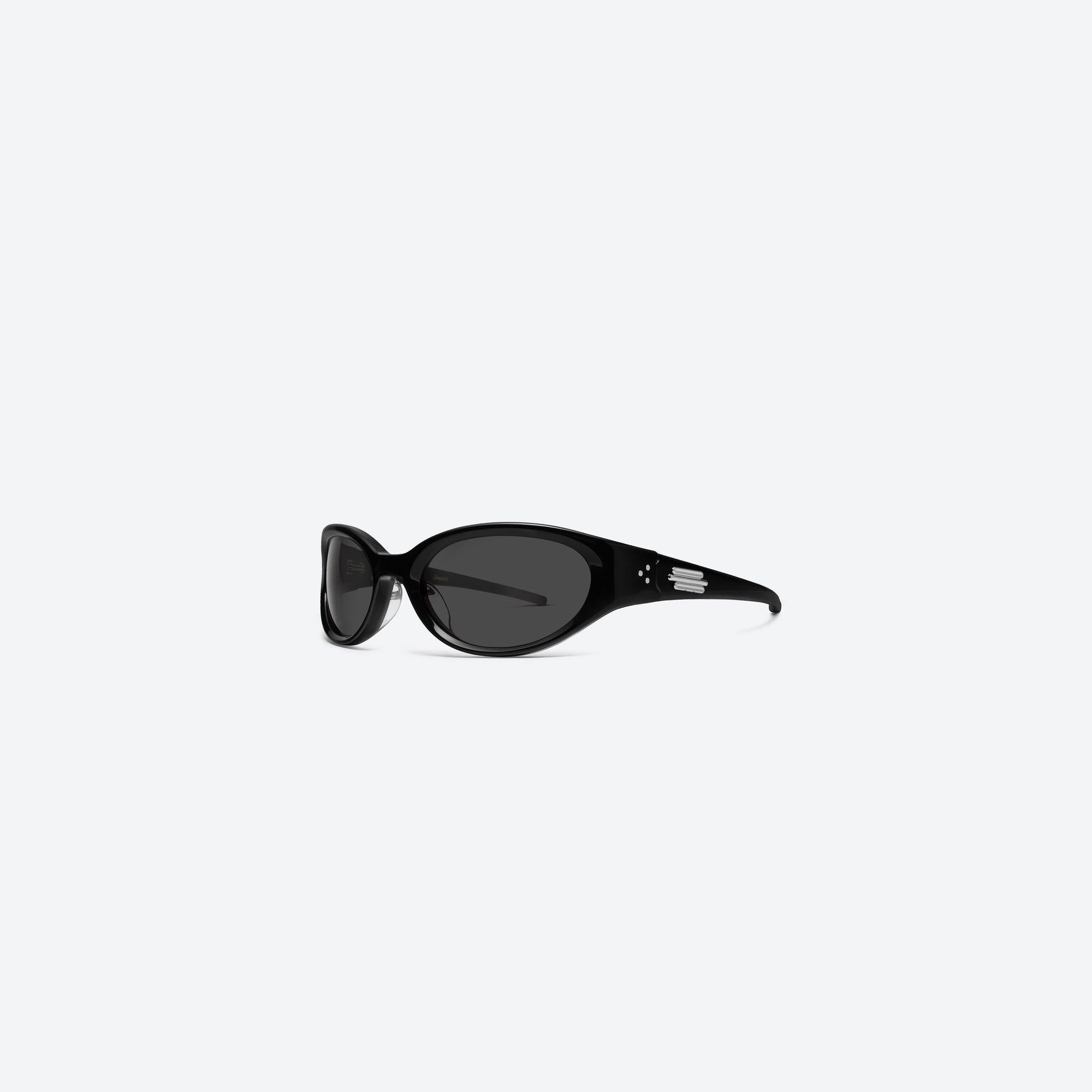 45-degree view of Gentle Monster Jennie - Donut Bun 01 Black Acetate framed Wraparound sunglasses.