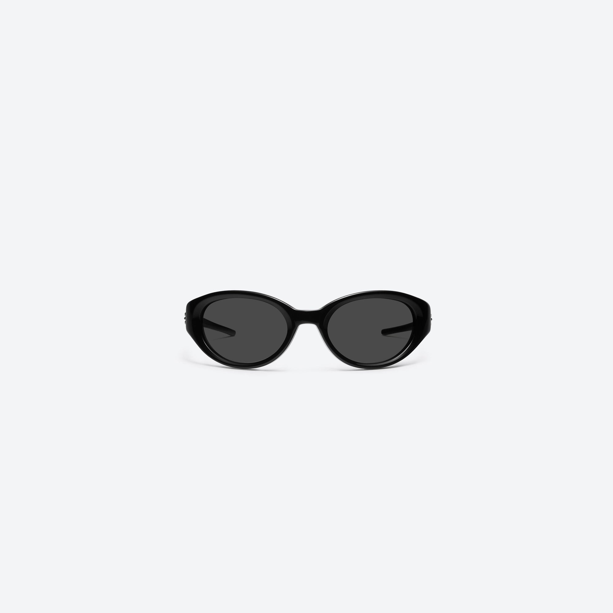 A front view of Gentle Monster Jennie - Donut Bun 01 Black Acetate framed Wraparound sunglasses.