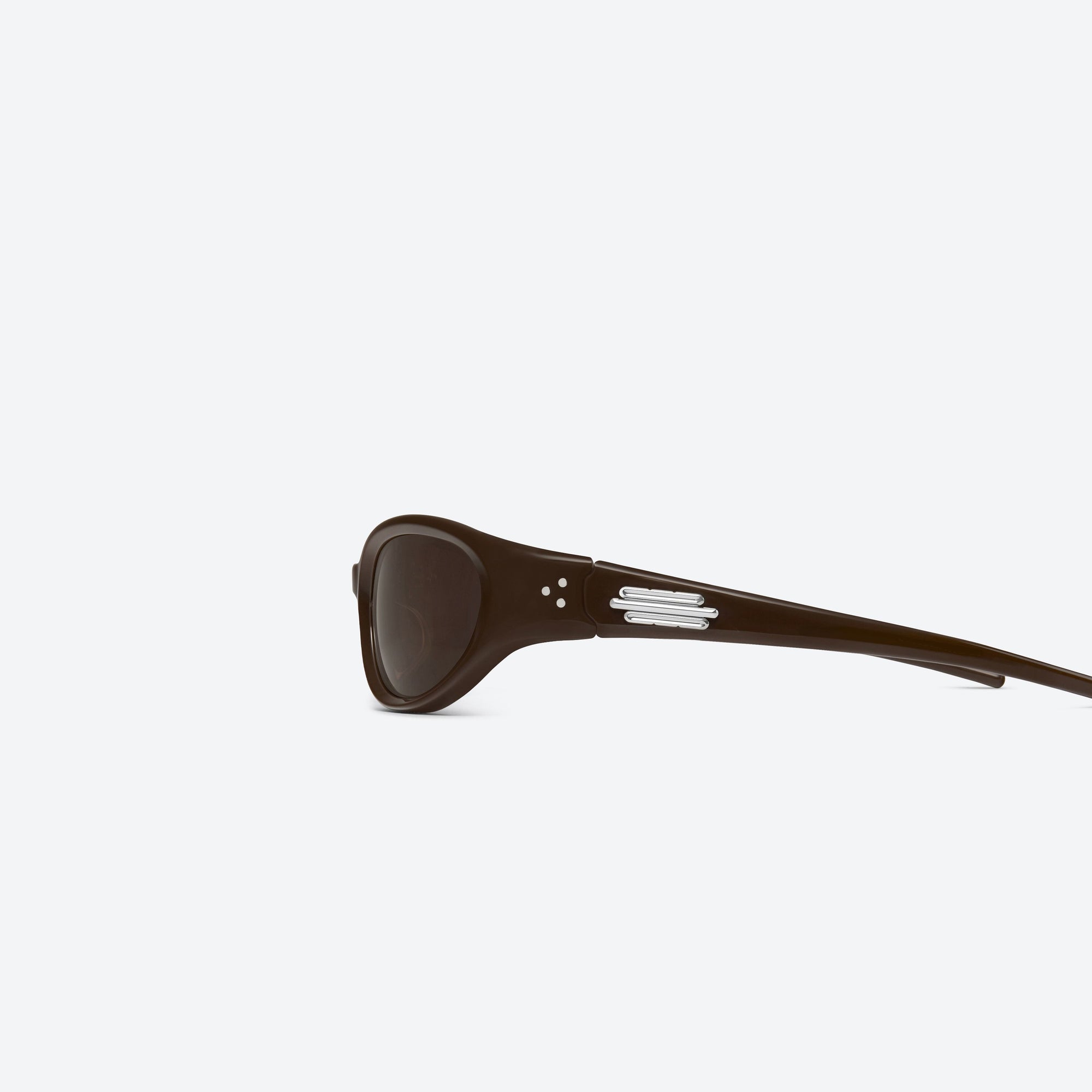 A detailed left view of Gentle Monster Jennie - Donut Bun BR3 Brown Acetate framed Wraparound sunglasses.