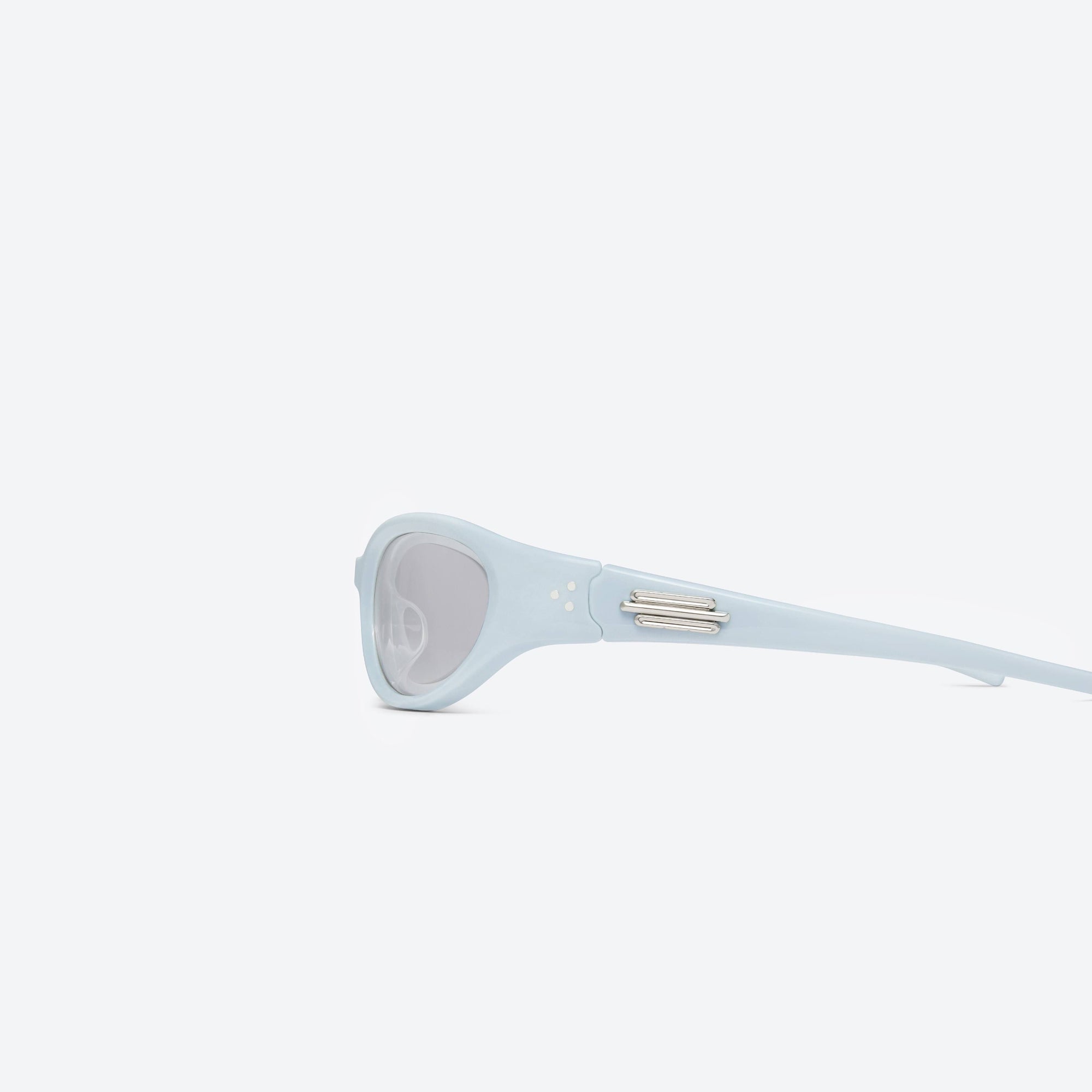 A detailed left view of Gentle Monster Jennie - Donut Bun BL5 Blue Acetate framed Wraparound sunglasses.