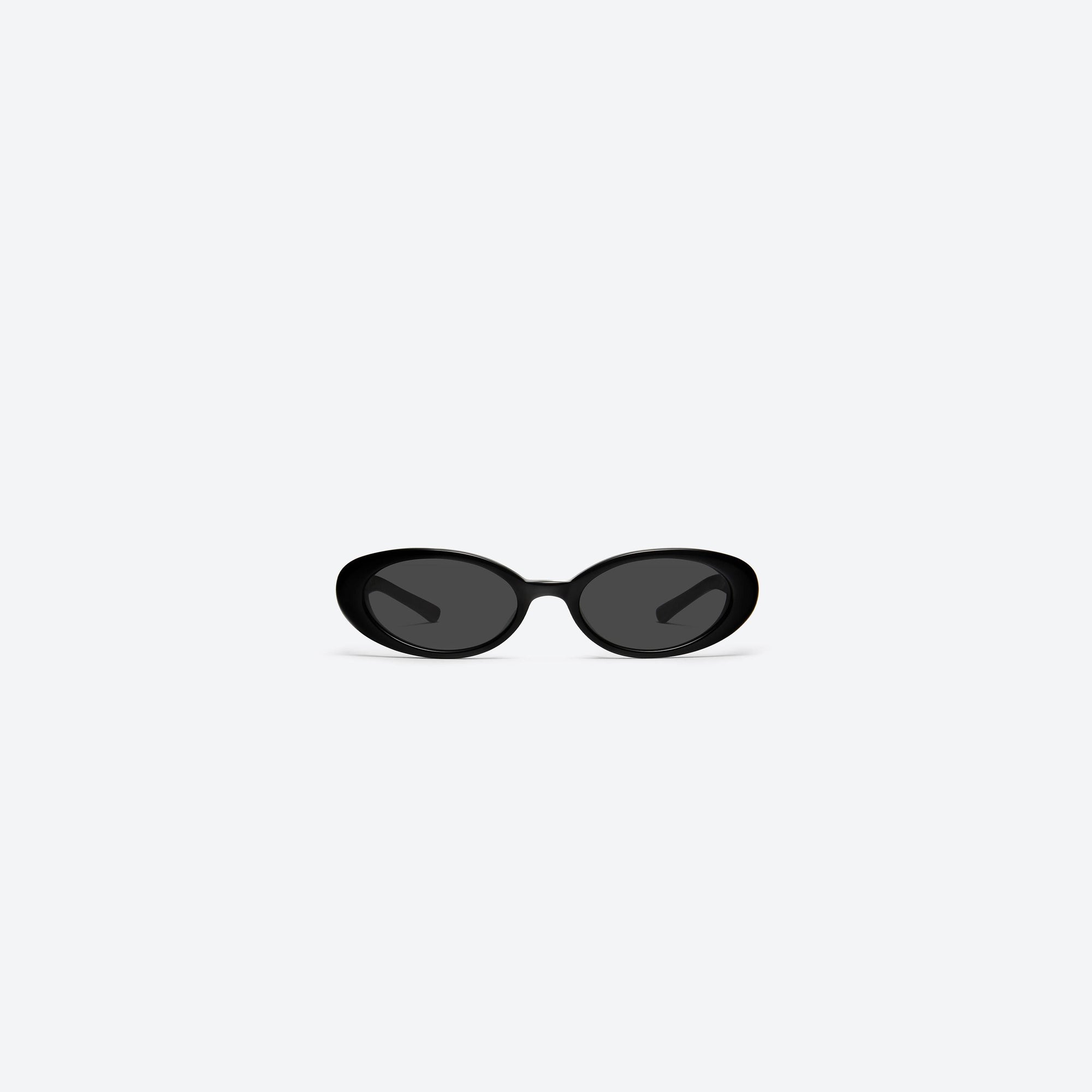 A front view of Gentle Monster Jennie - Hush 01 Black Acetate framed Oval sunglasses.