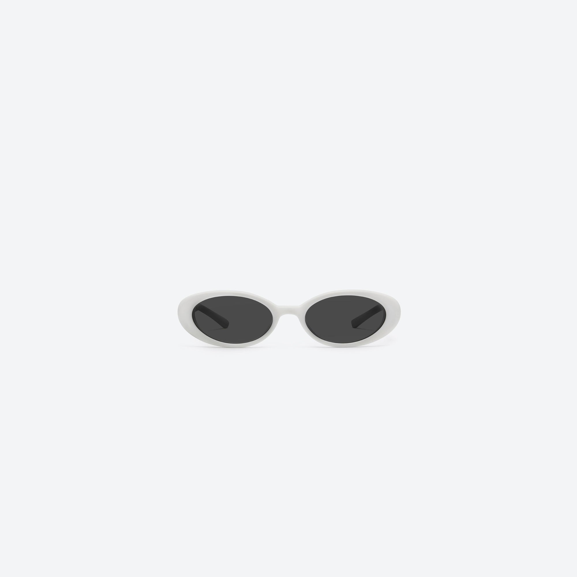 A front view of Gentle Monster Jennie - Hush W2 White Acetate framed Oval sunglasses.