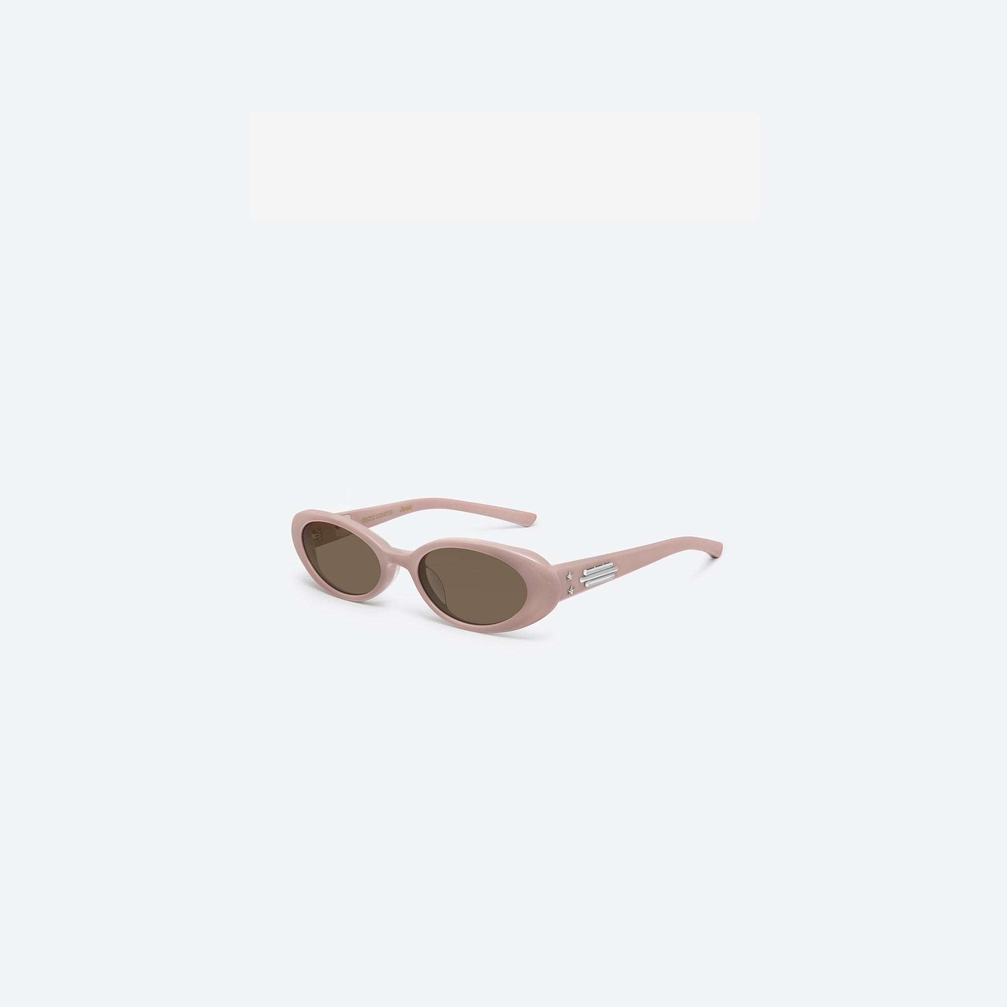 45-degree view of Gentle Monster Jennie - Hush P7 Pink Acetate framed Oval sunglasses.