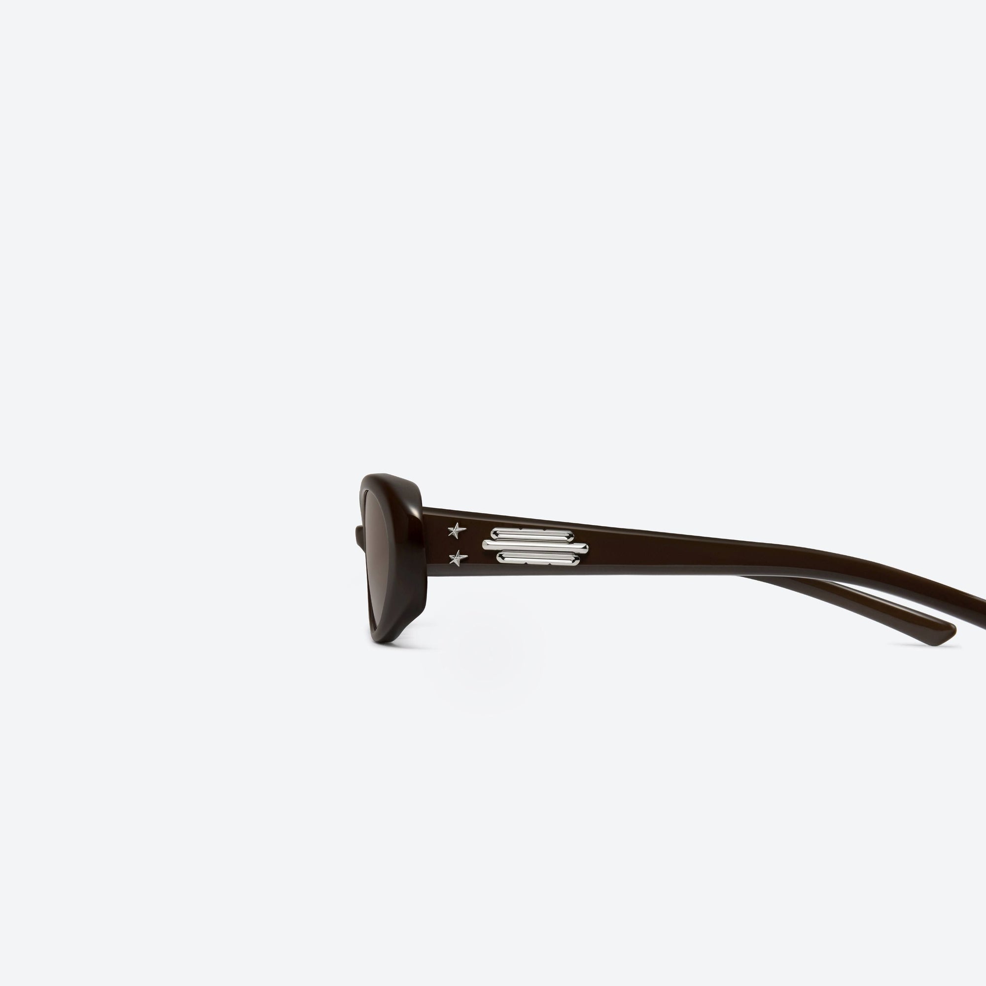 A detailed left view of Gentle Monster Jennie - Hush BR3 Brown Acetate framed Oval sunglasses.