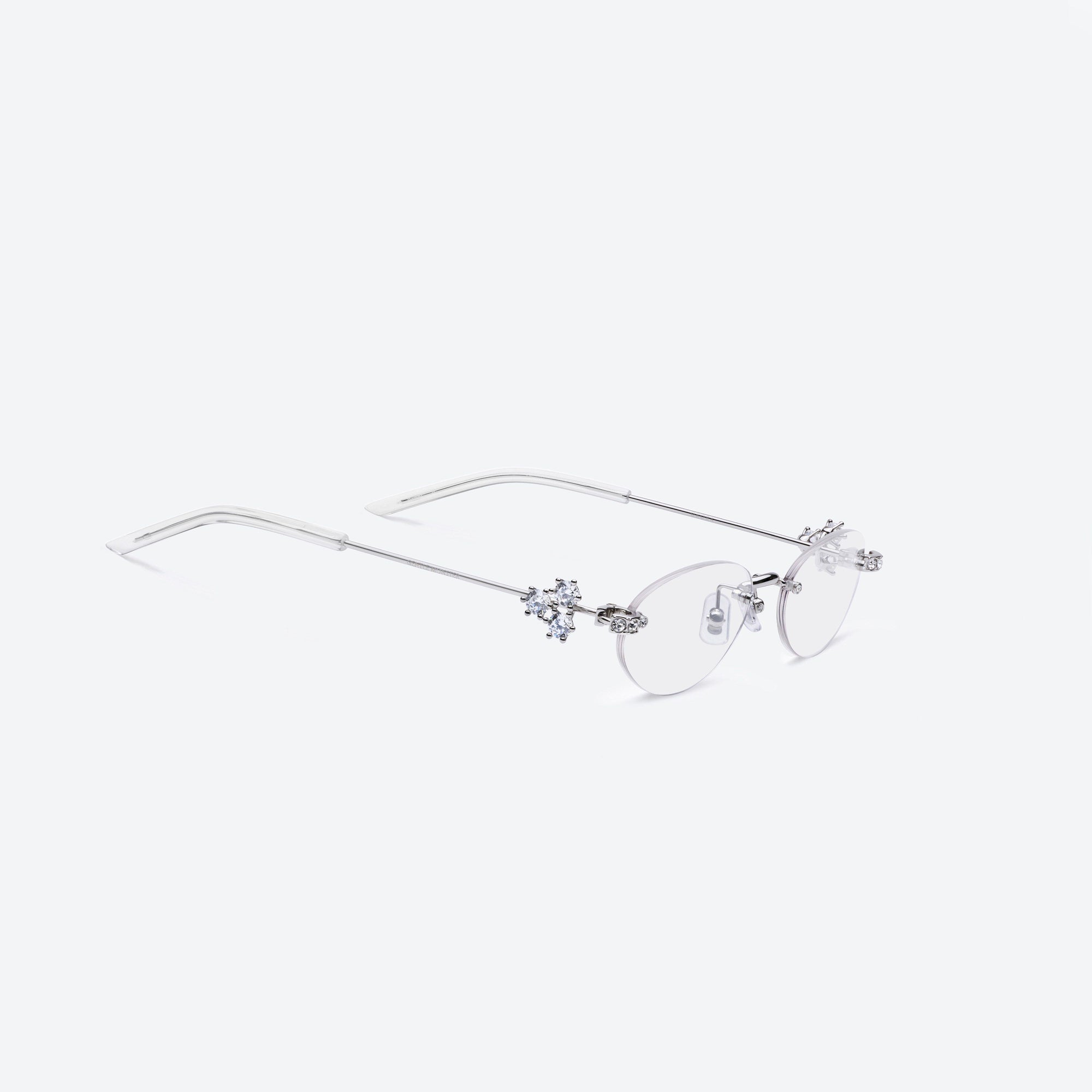 45-degree detailed view of Gentle Monster Orora 02 Silver Metal framed Oval sunglasses.