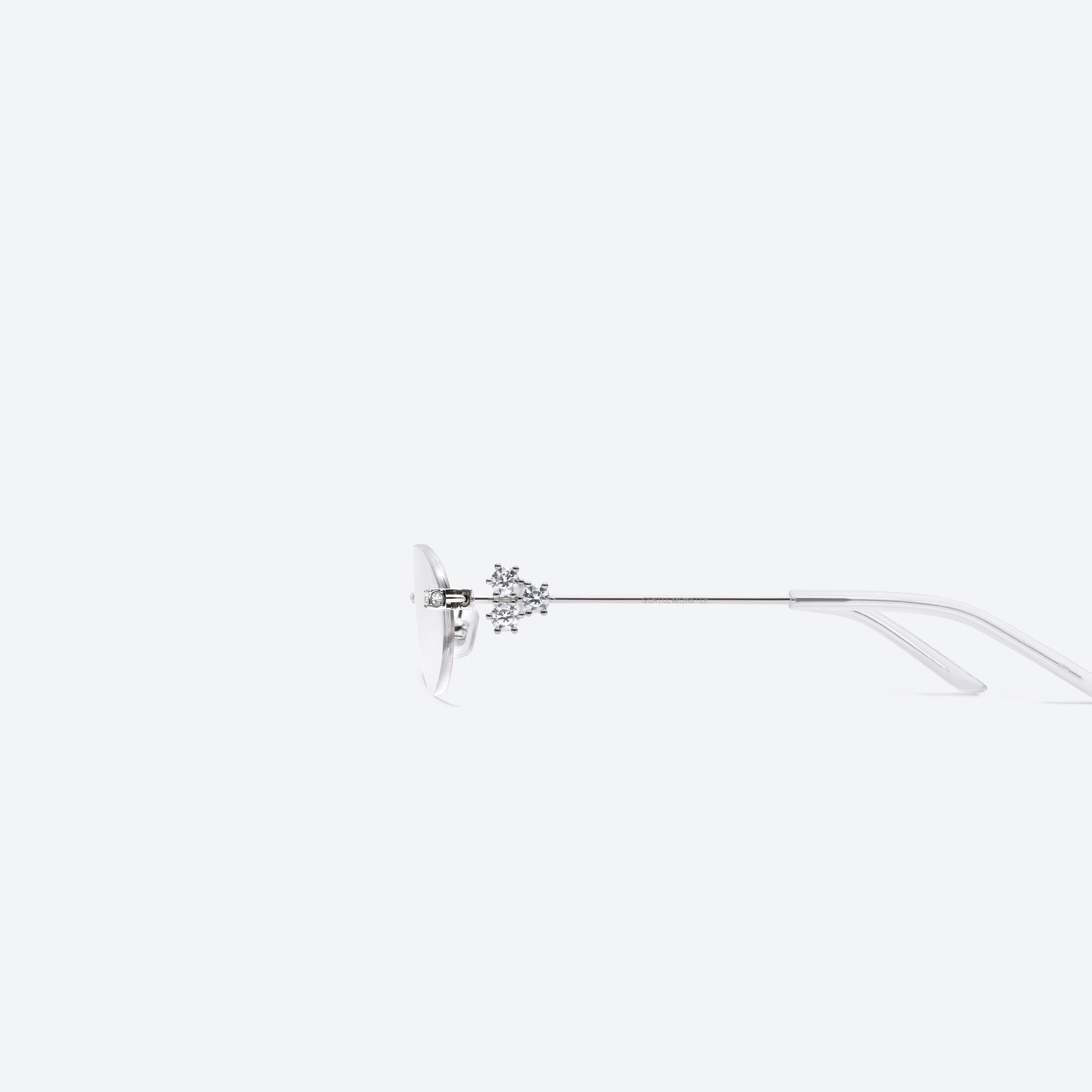 A detailed left view of Gentle Monster Orora 02 Silver Metal framed Oval sunglasses.