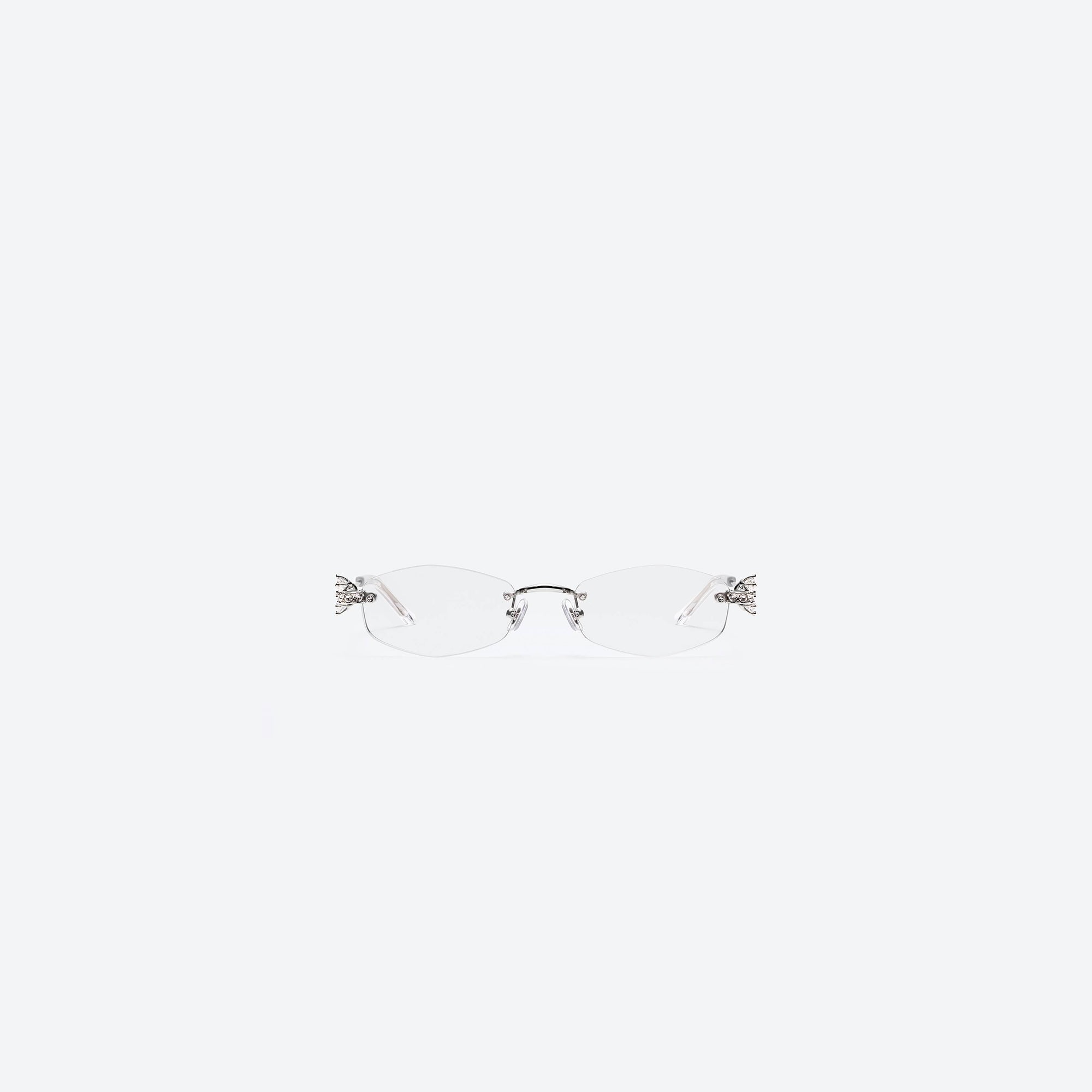 A front view of Gentle Monster Glitz 02 Silver Metal framed Oval sunglasses.