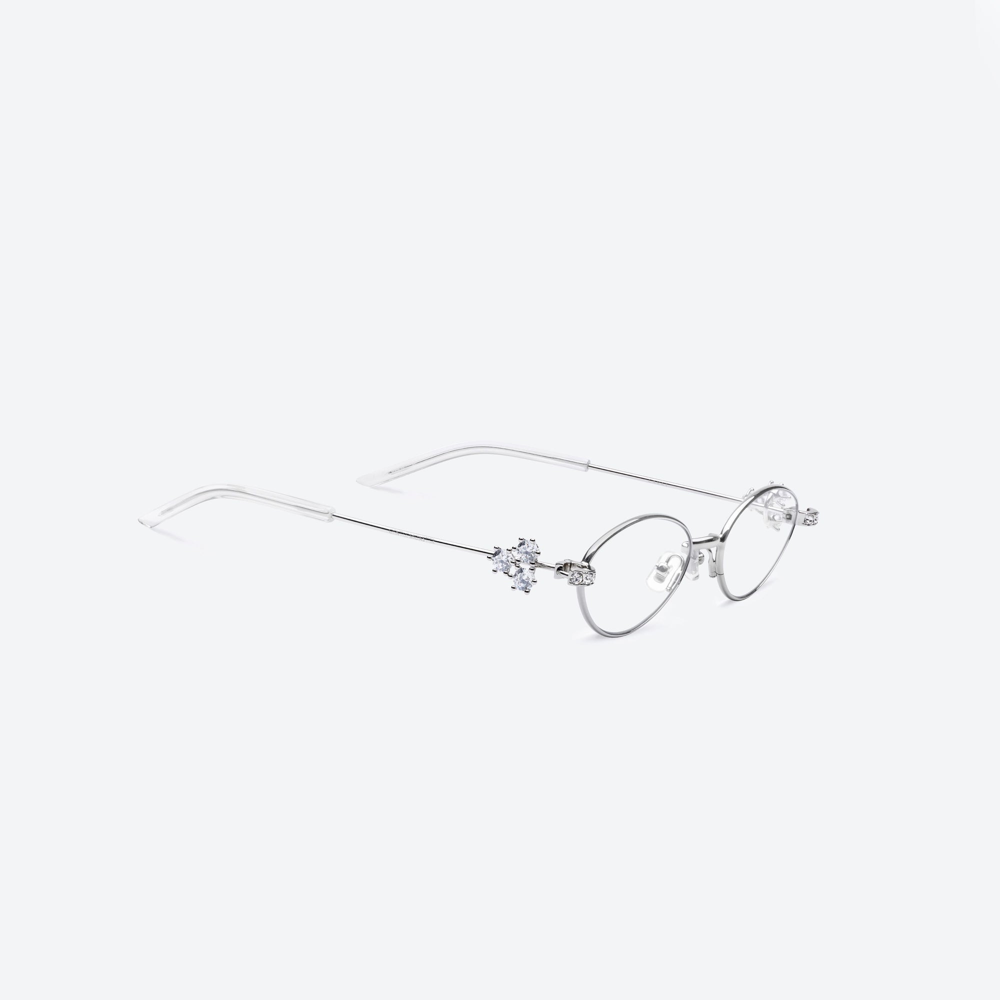 45-degree detailed view of Gentle Monster Carat 02 Silver Metal framed Oval sunglasses.