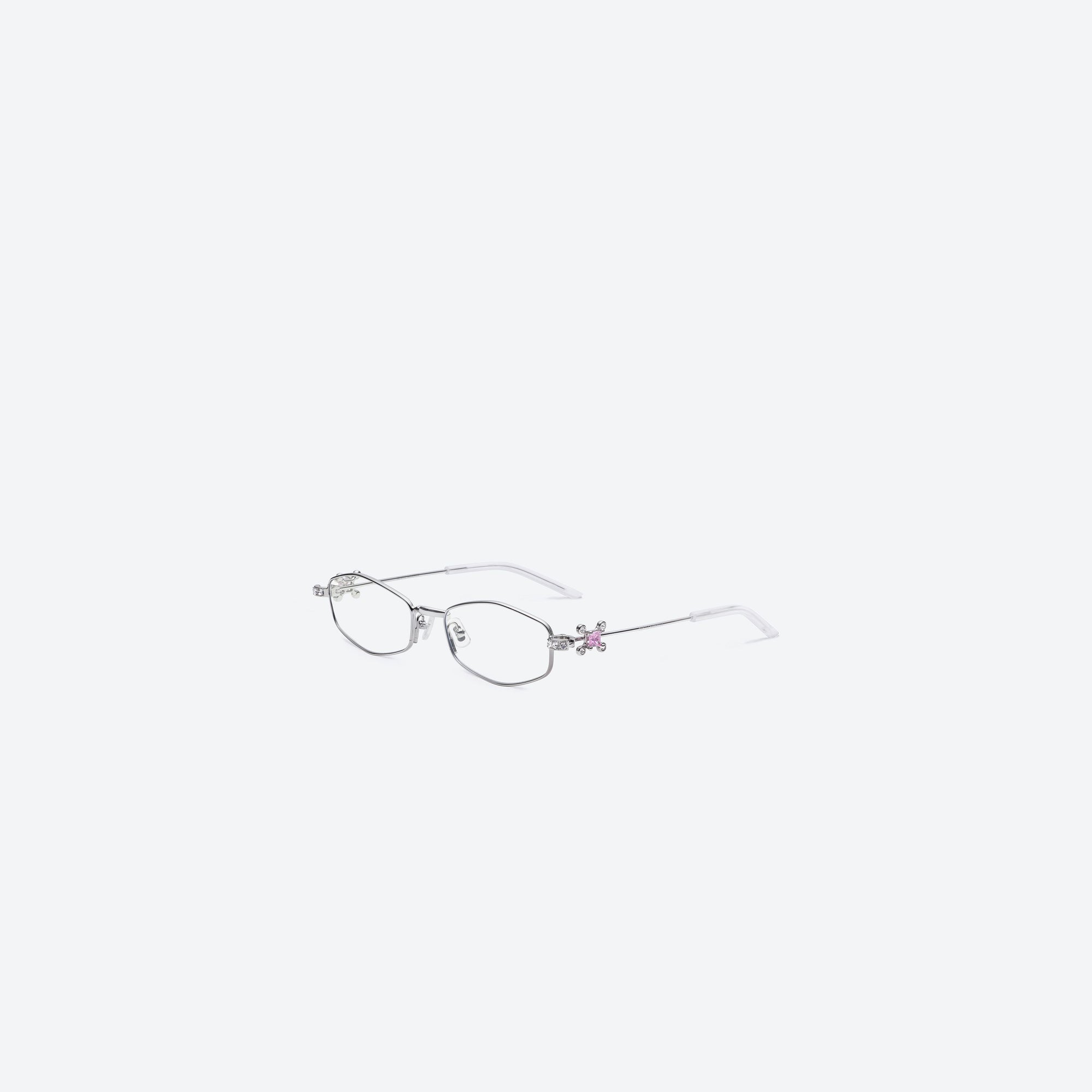 45-degree view of Gentle Monster Gleam 02 Silver Metal framed Oval sunglasses.