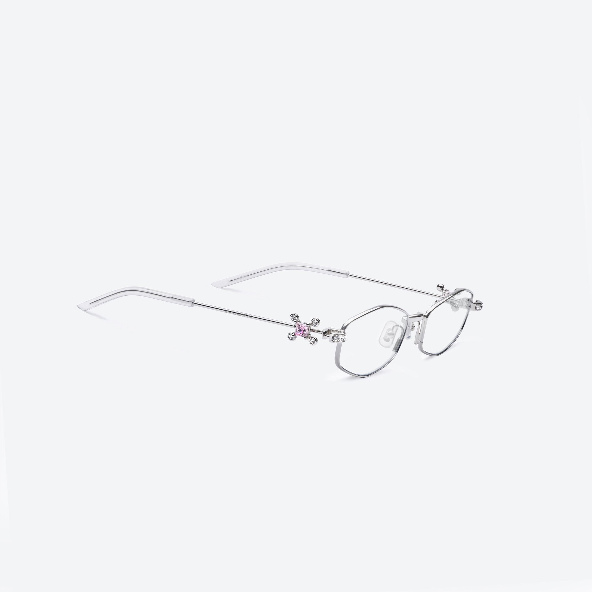 45-degree detailed view of Gentle Monster Gleam 02 Silver Metal framed Oval sunglasses.