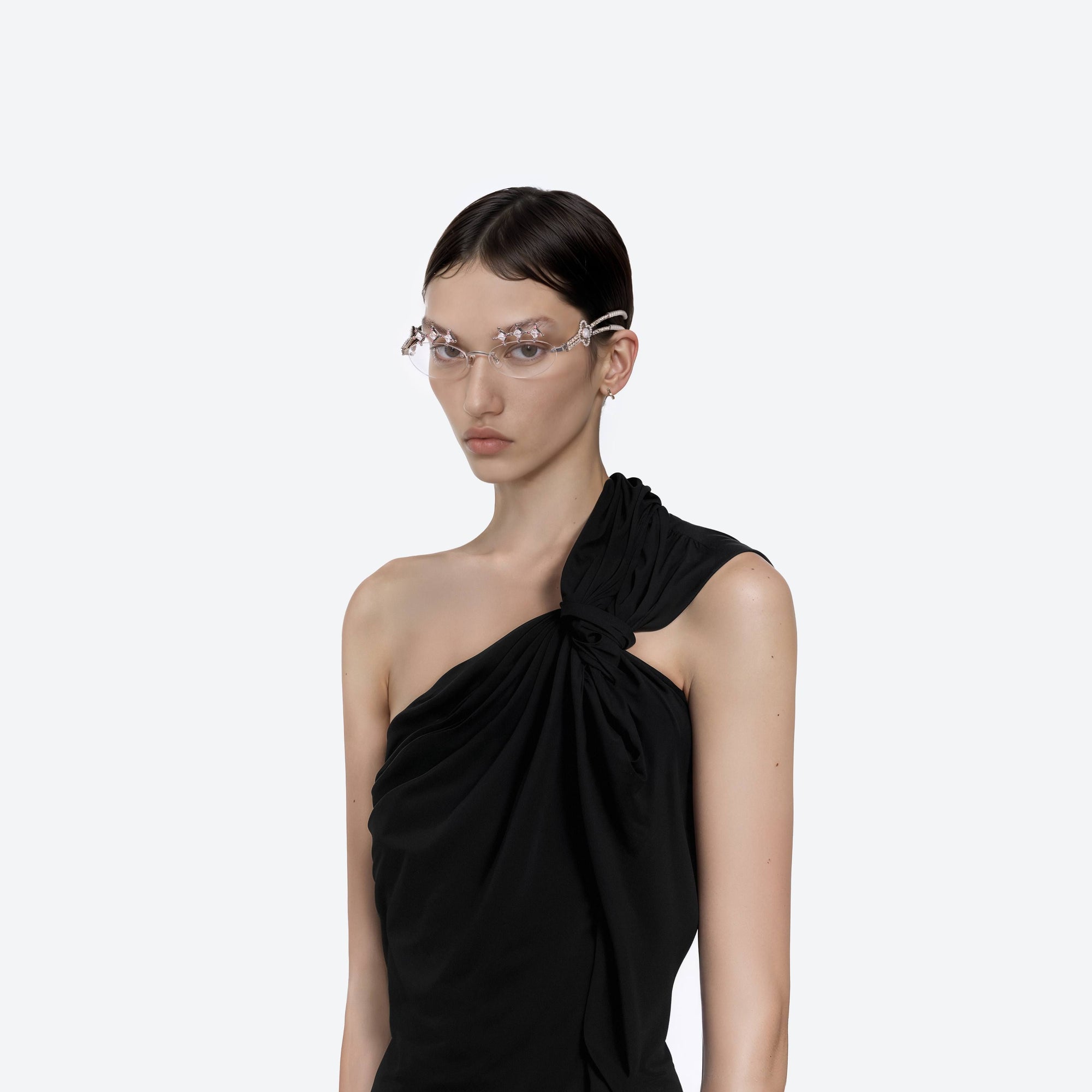 Model wearing the Briolette 02 Silver Metal framed Oval sunglasses.
