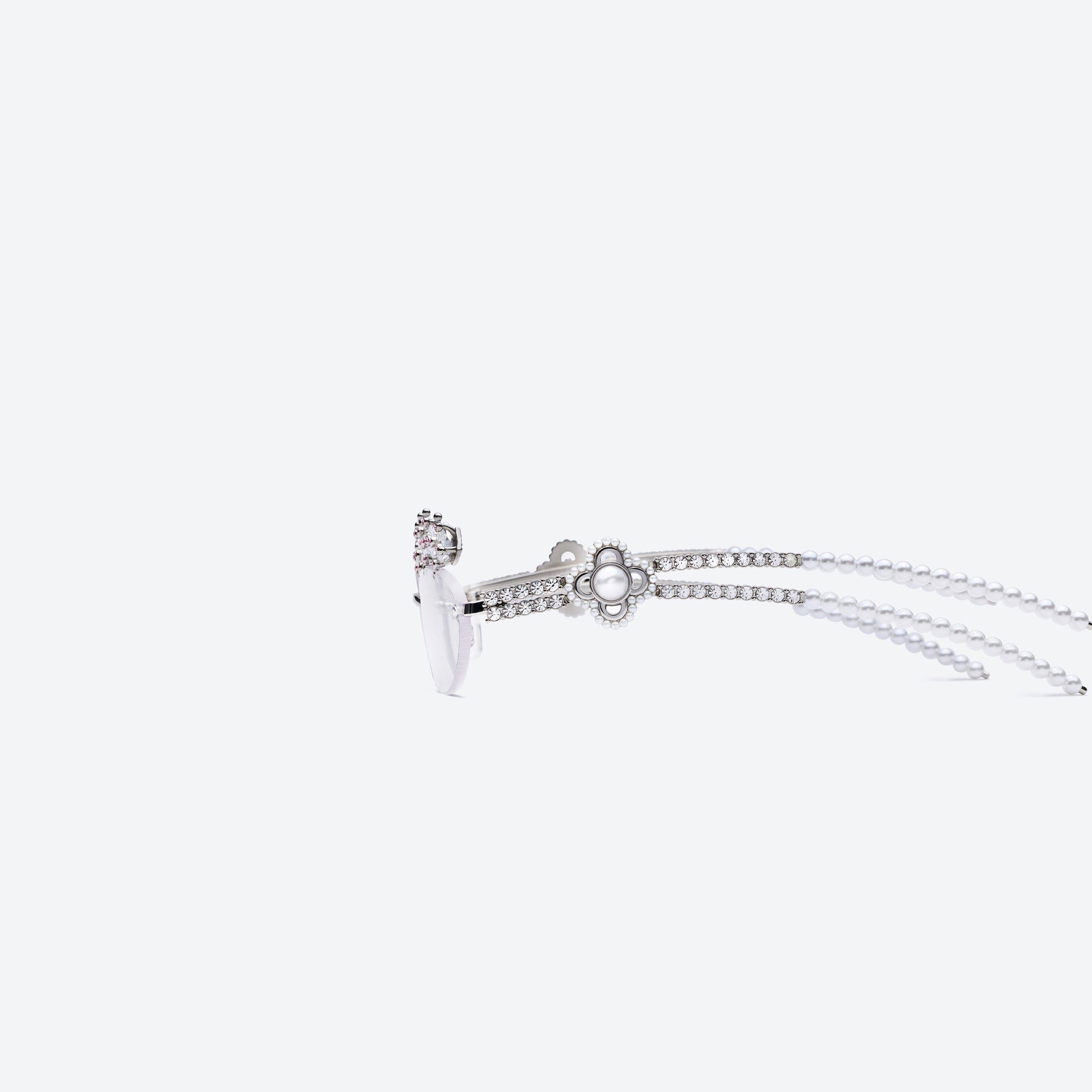 A detailed left view of Gentle Monster Briolette 02 Silver Metal framed Oval sunglasses.
