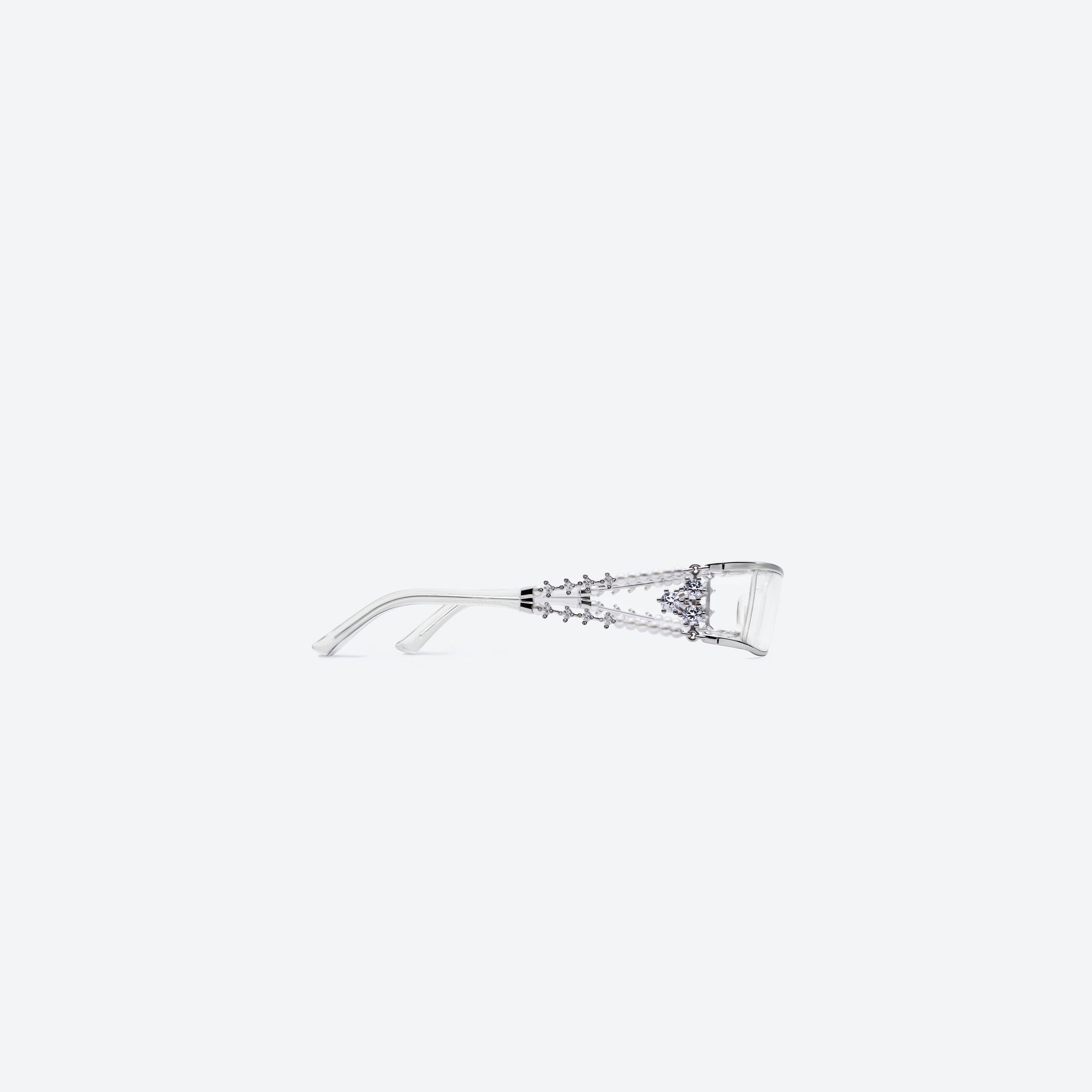 A detailed right view of Gentle Monster Kiira 02 Silver Metal framed Square sunglasses.