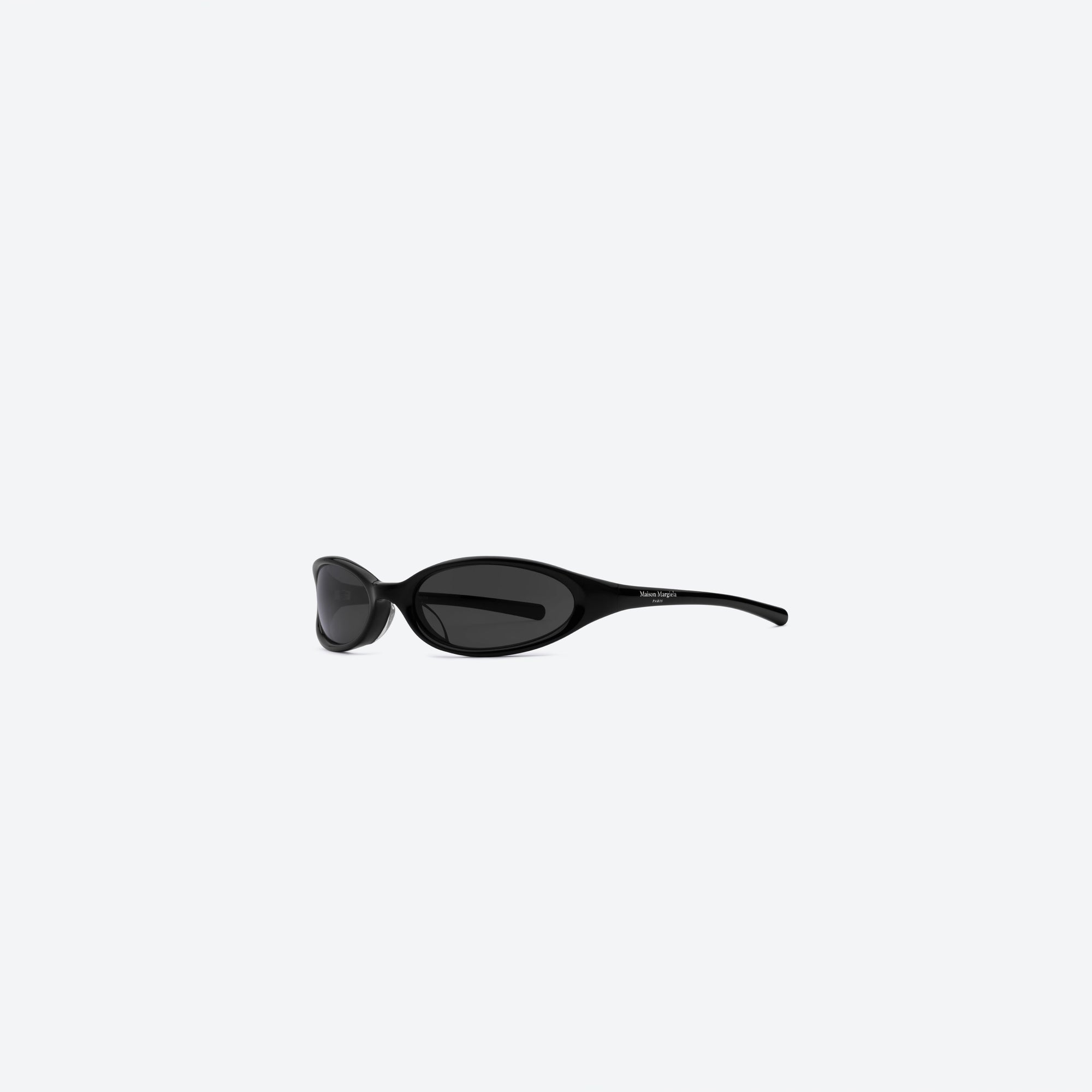 45-degree view of Gentle Monster Maison Margiela - MM202 01 Black Acetate framed Wraparound sunglasses.