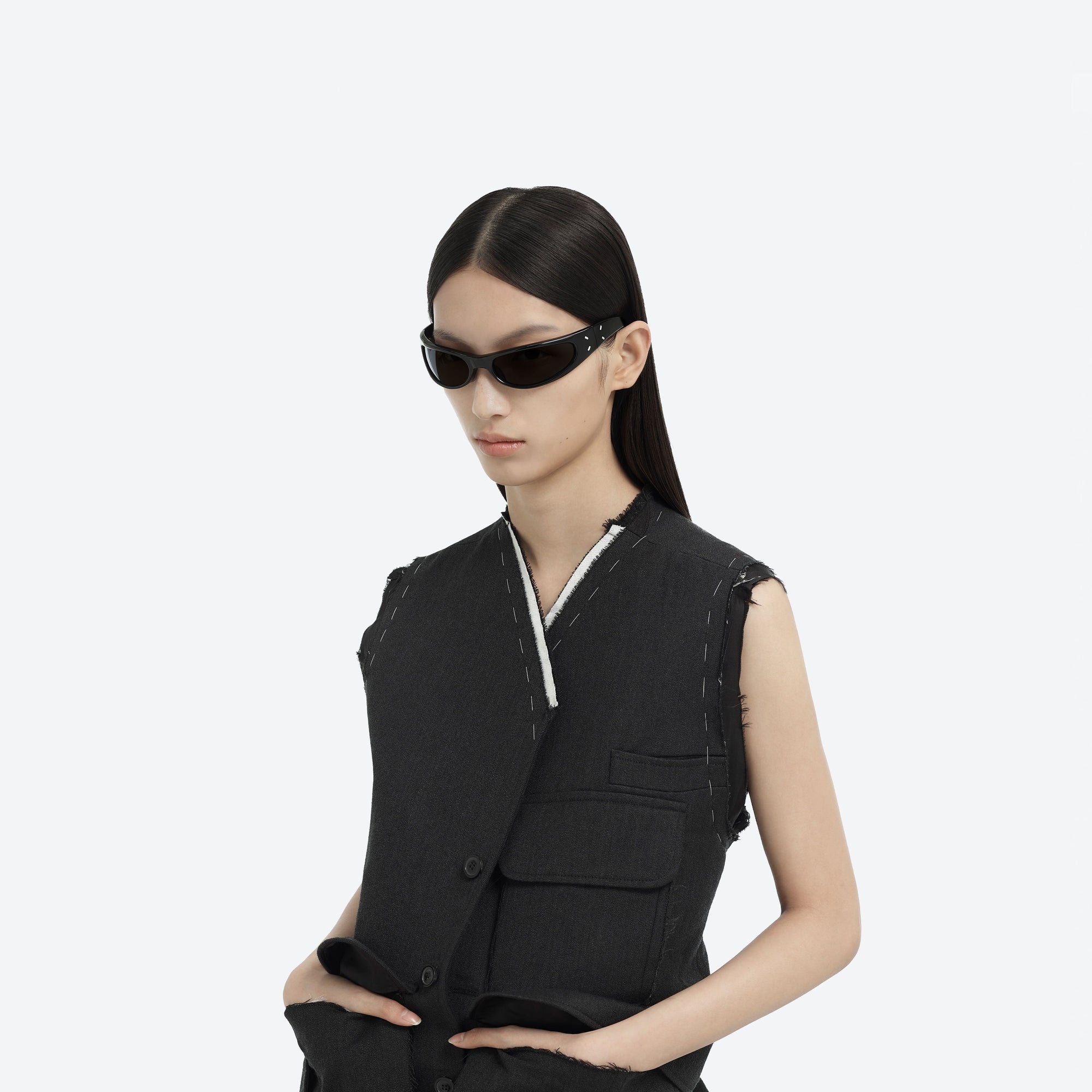 Model wearing the Maison Margiela - MM203 01 Black Acetate framed Wraparound sunglasses.