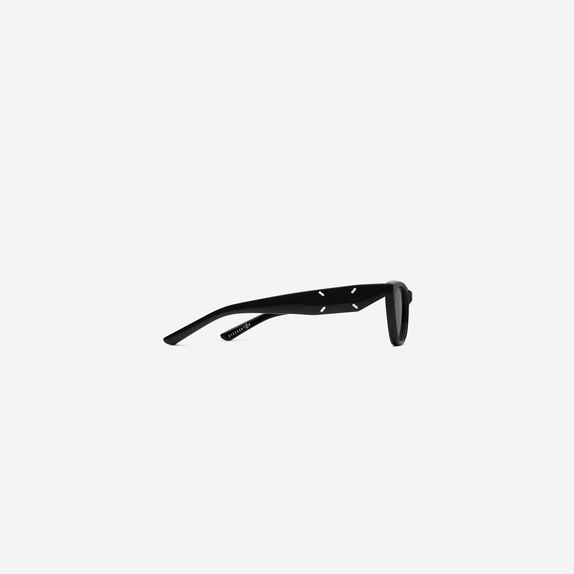 A detailed right view of Gentle Monster Maison Margiela - MM208 01 Black Acetate framed Cat-eye sunglasses.