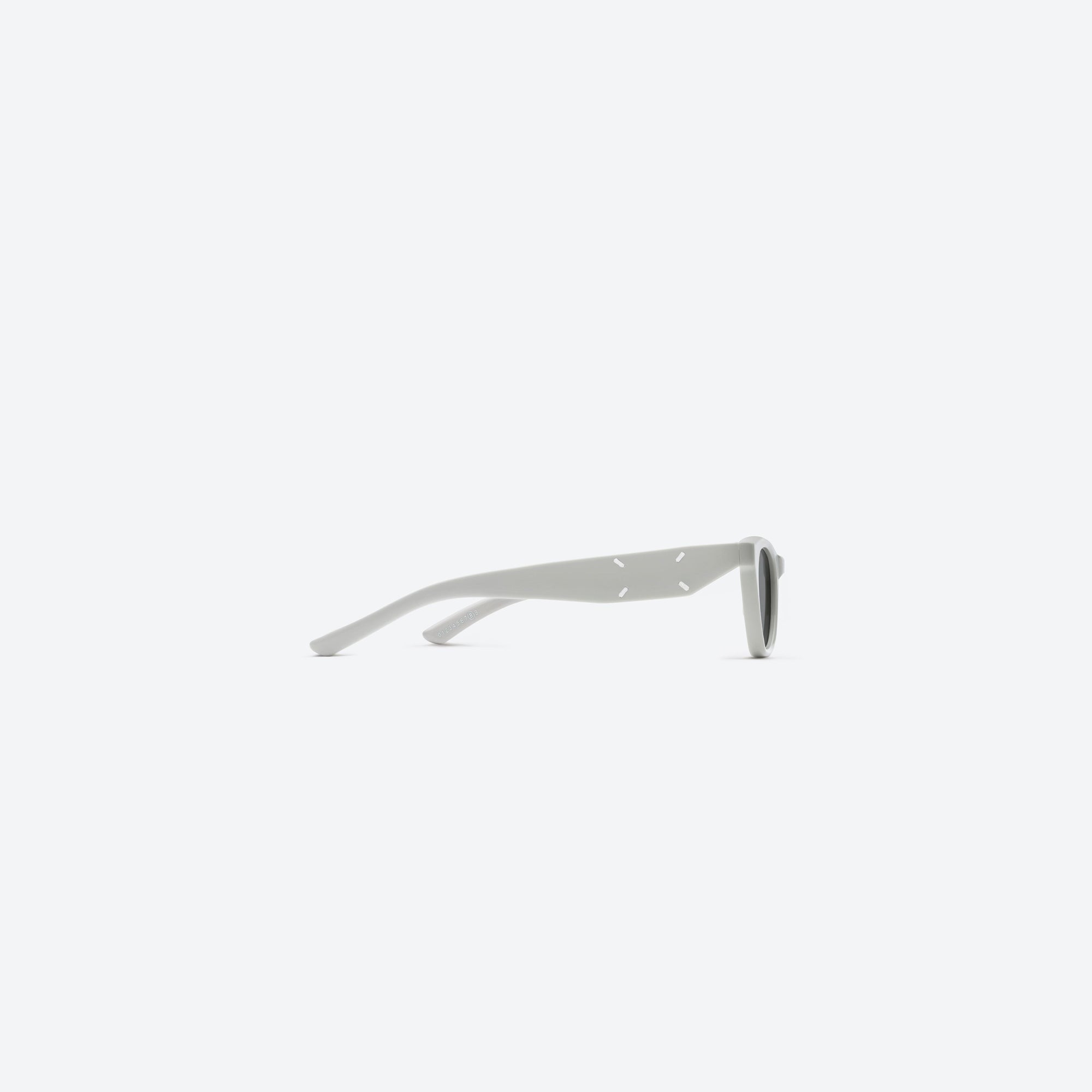 A detailed right view of Gentle Monster Maison Margiela - MM208 G12 Gray Acetate framed Cat-eye sunglasses.