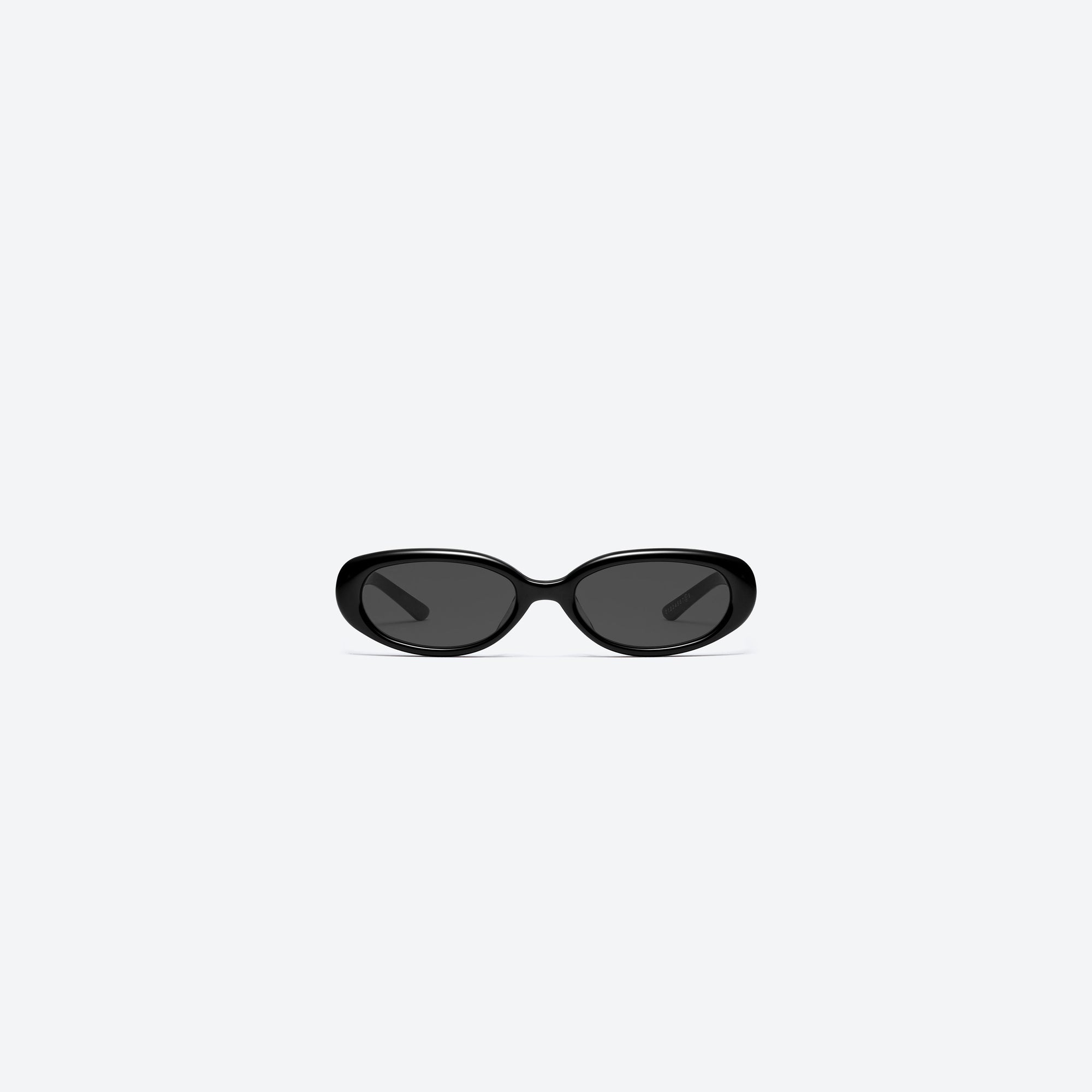 A front view of Gentle Monster Maison Margiela - MM206 01 Black Acetate framed Oval sunglasses.