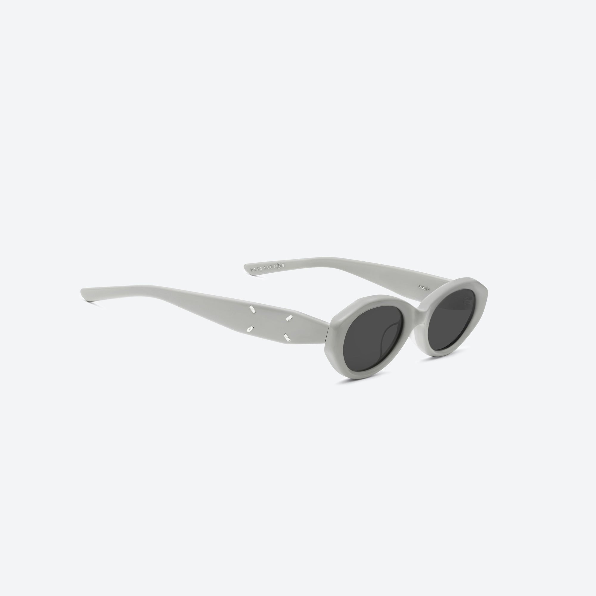 45-degree detailed view of Gentle Monster Maison Margiela - MM204 G12 Gray Acetate framed Oval sunglasses.