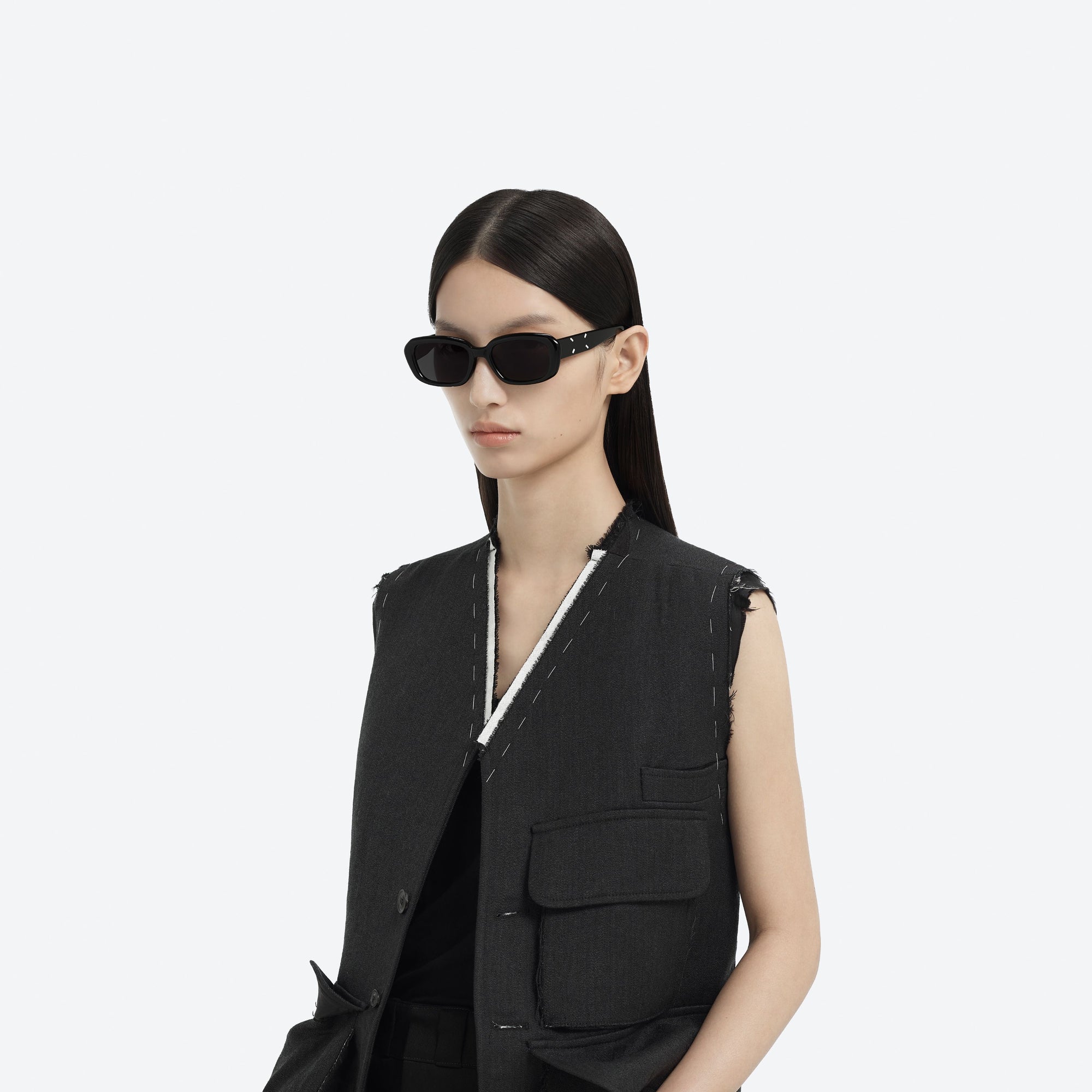 Model wearing the Maison Margiela - MM207 01 Black Acetate framed Square sunglasses.