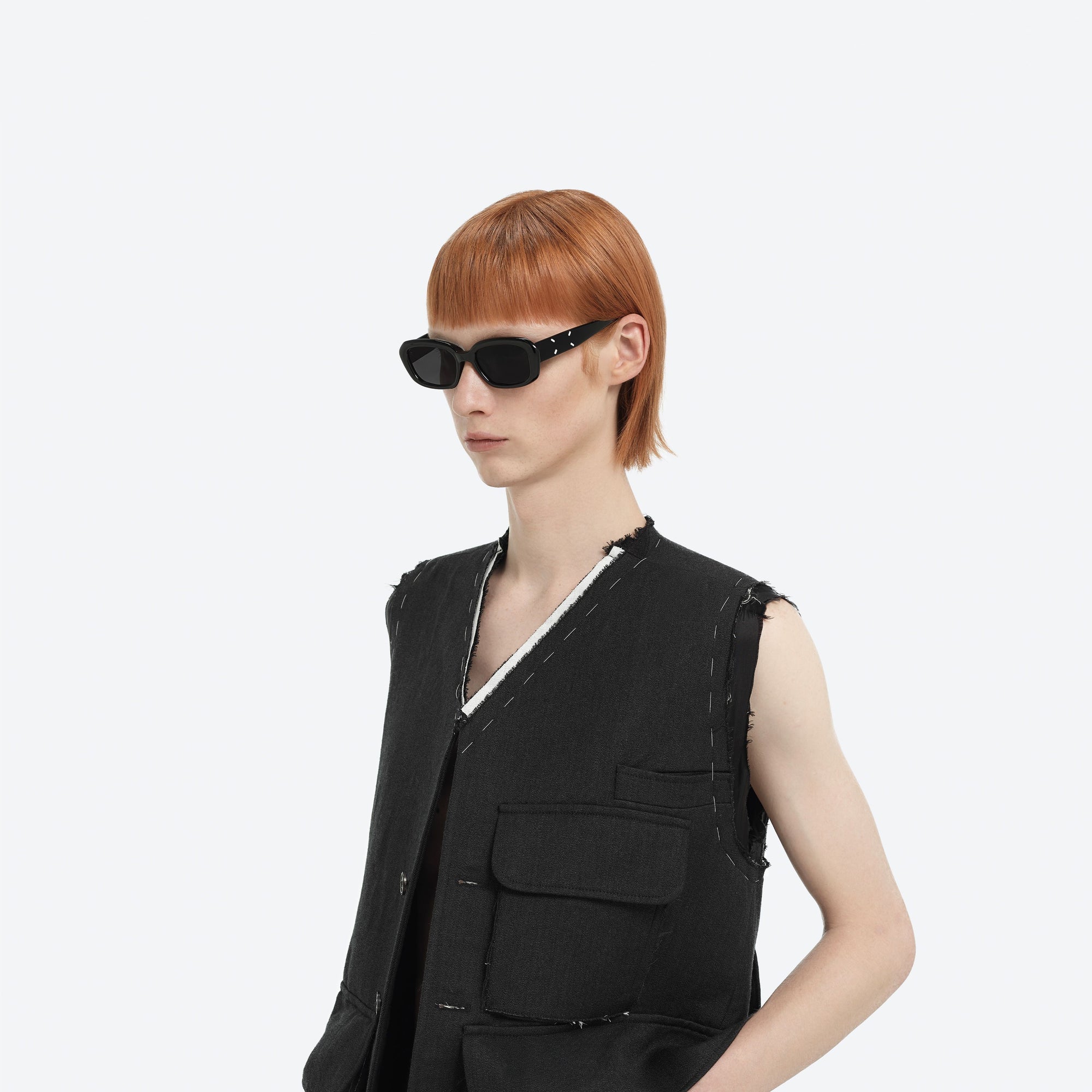 Model wearing the Maison Margiela - MM207 01 Black Acetate framed Square sunglasses.