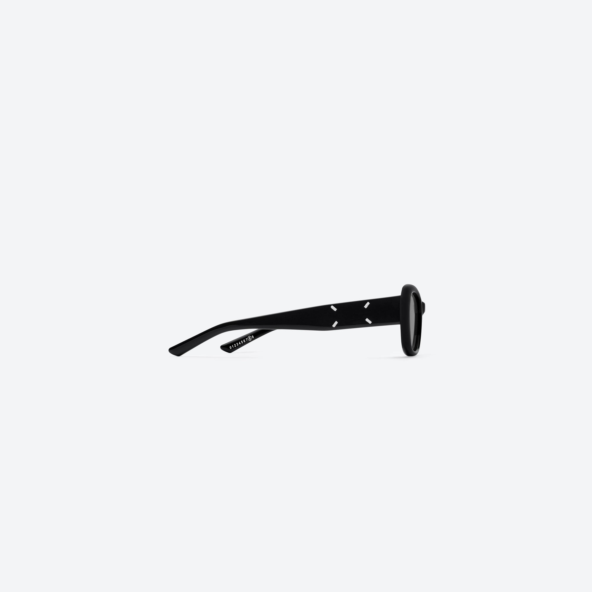 A detailed right view of Gentle Monster Maison Margiela - MM207 01 Black Acetate framed Square sunglasses.