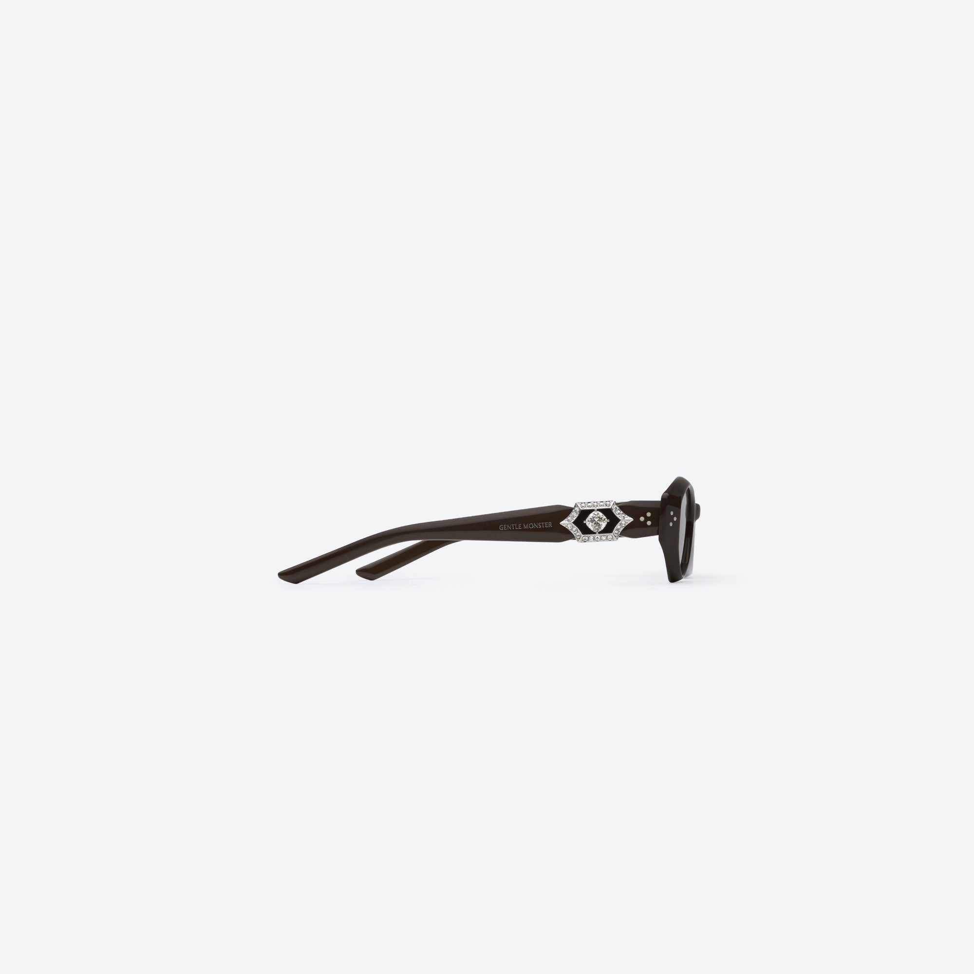 A detailed right view of Gentle Monster Vegax BR3 Brown Acetate framed Oval sunglasses.