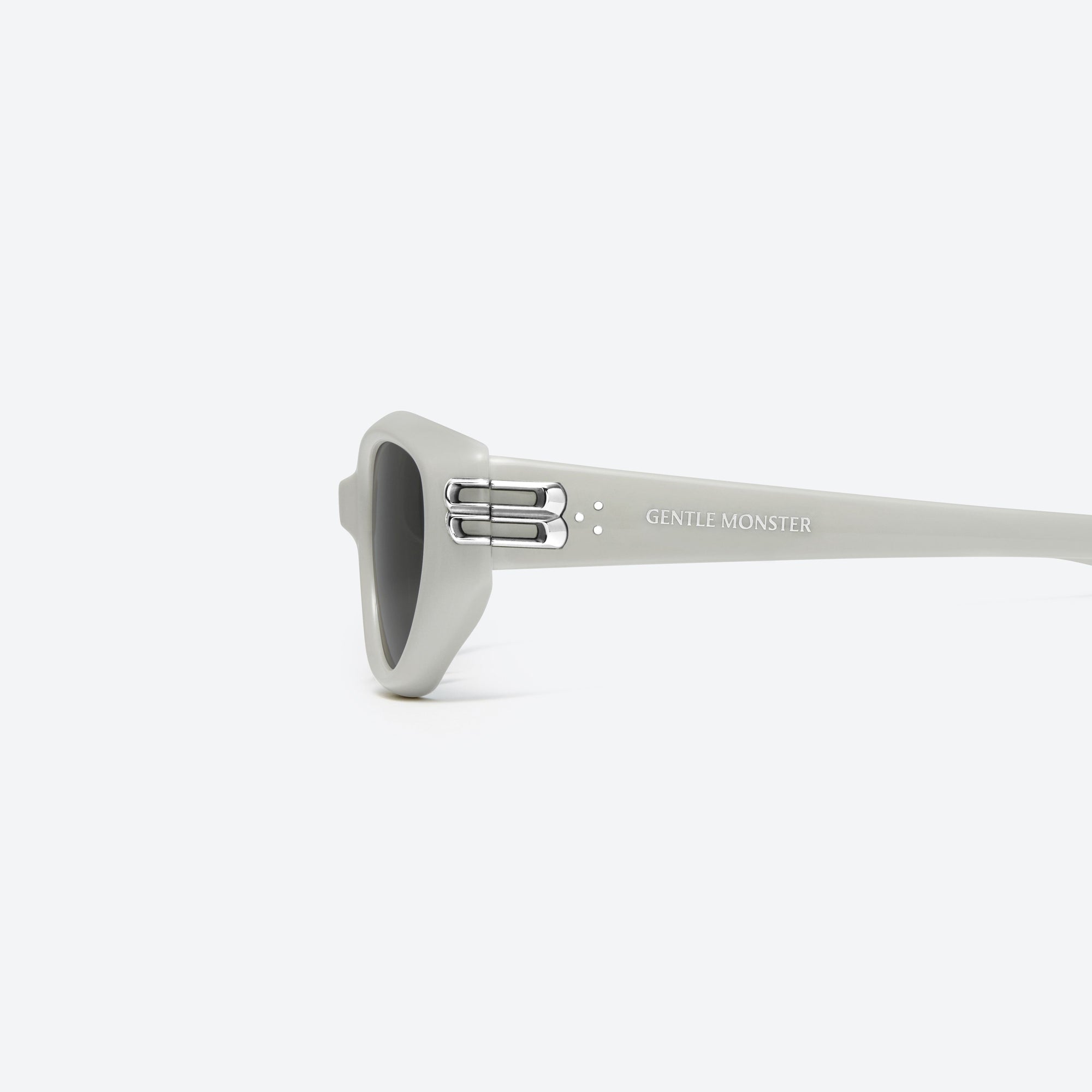 A detailed left view of Gentle Monster Sosomo G12 Gray Acetate framed Oval sunglasses.