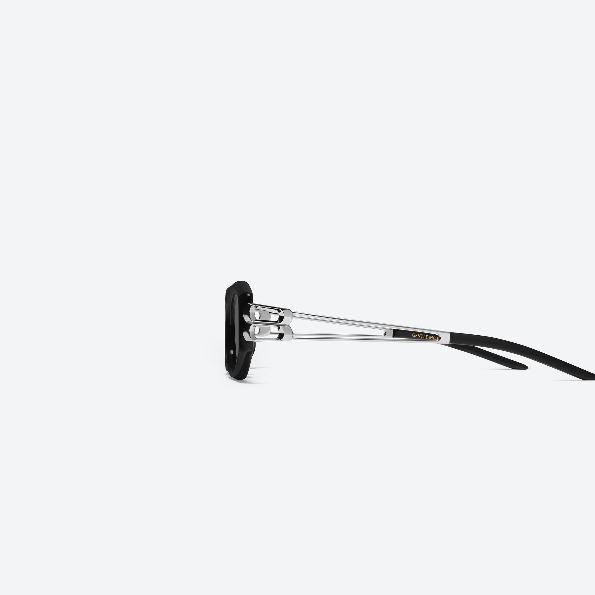A detailed left view of Gentle Monster Solid Loop 01 Black Mixed framed Square sunglasses.