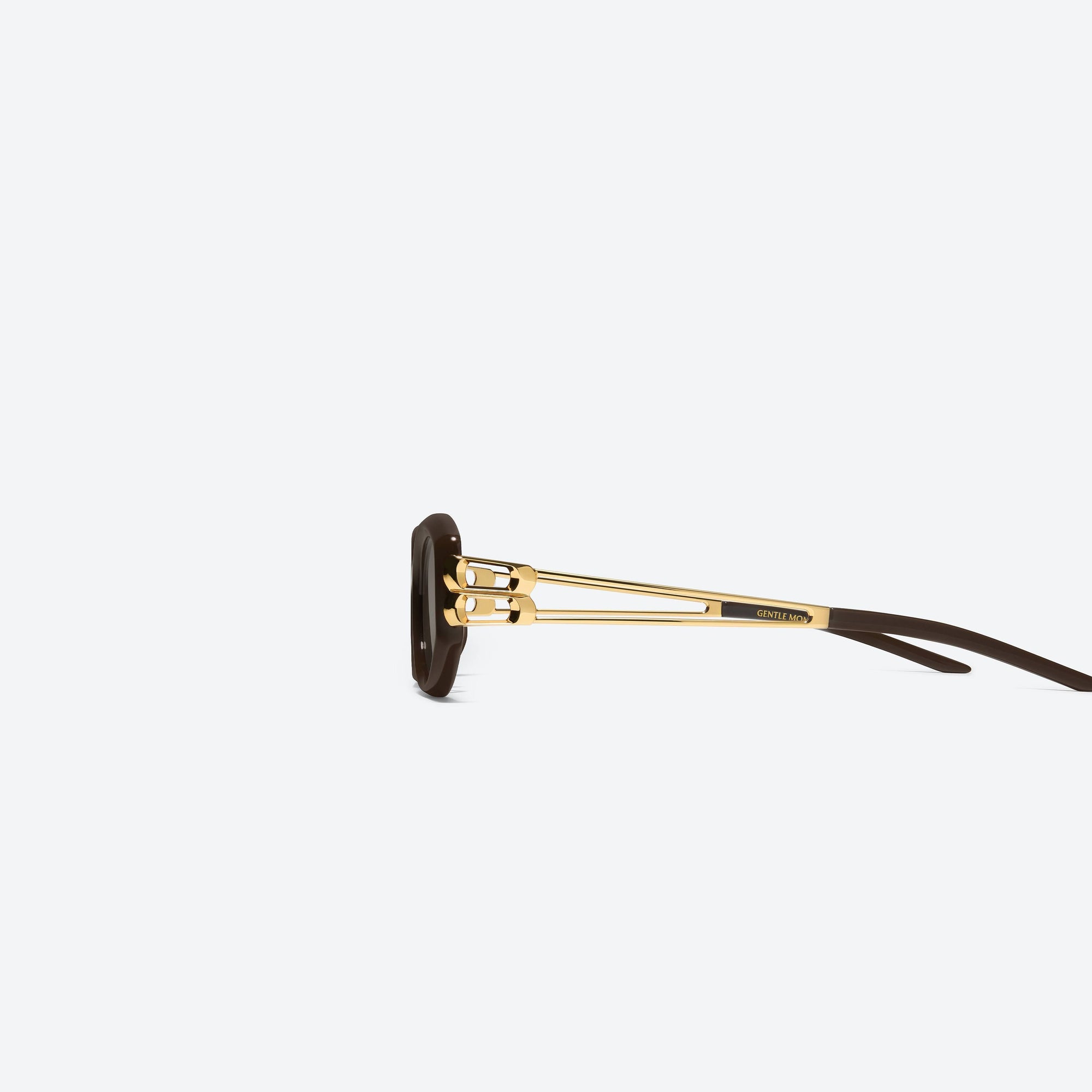 A detailed left view of Gentle Monster Solid Loop BR3 Brown Mixed framed Square sunglasses.