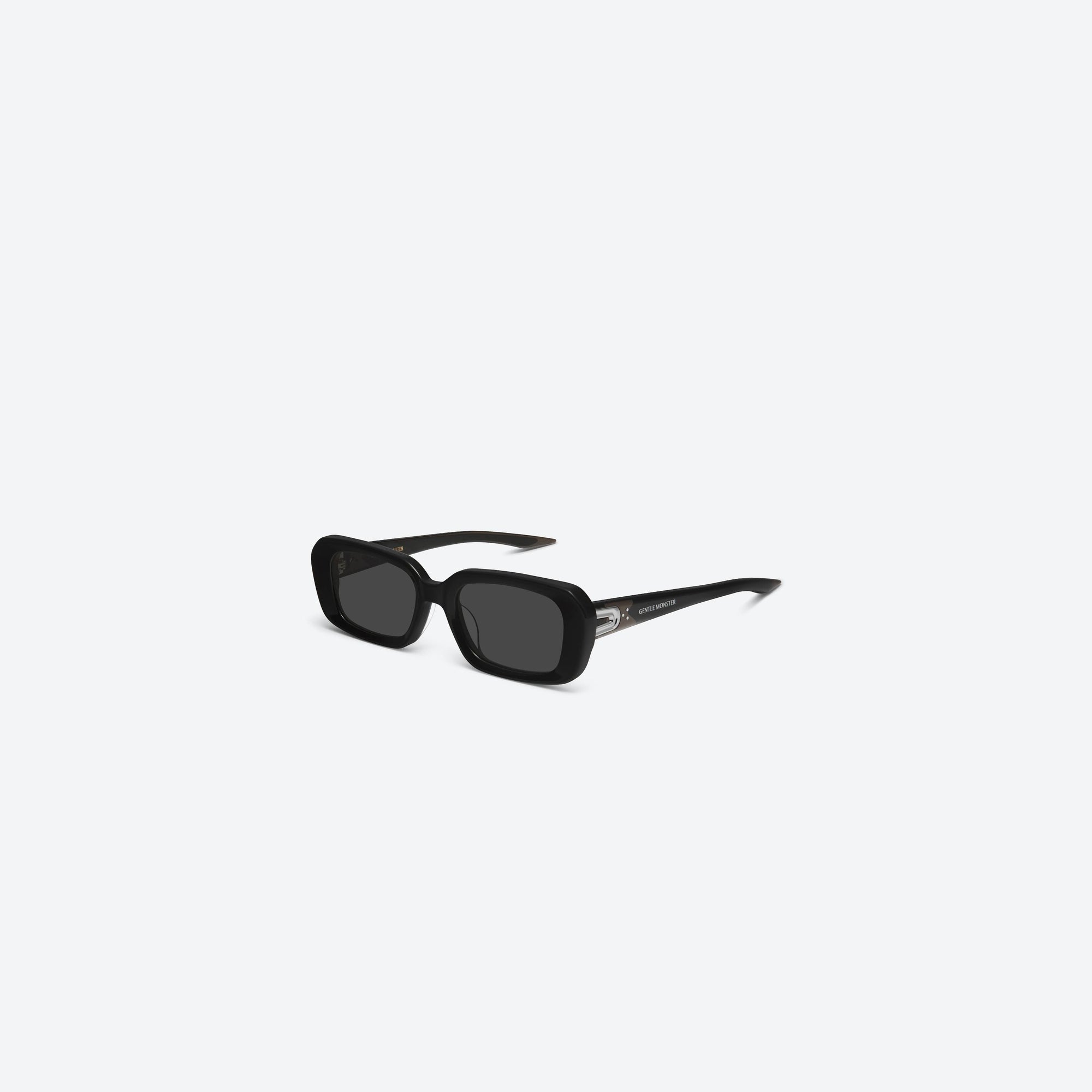 45-degree view of Gentle Monster Melrose 01 Black Acetate framed Square sunglasses.