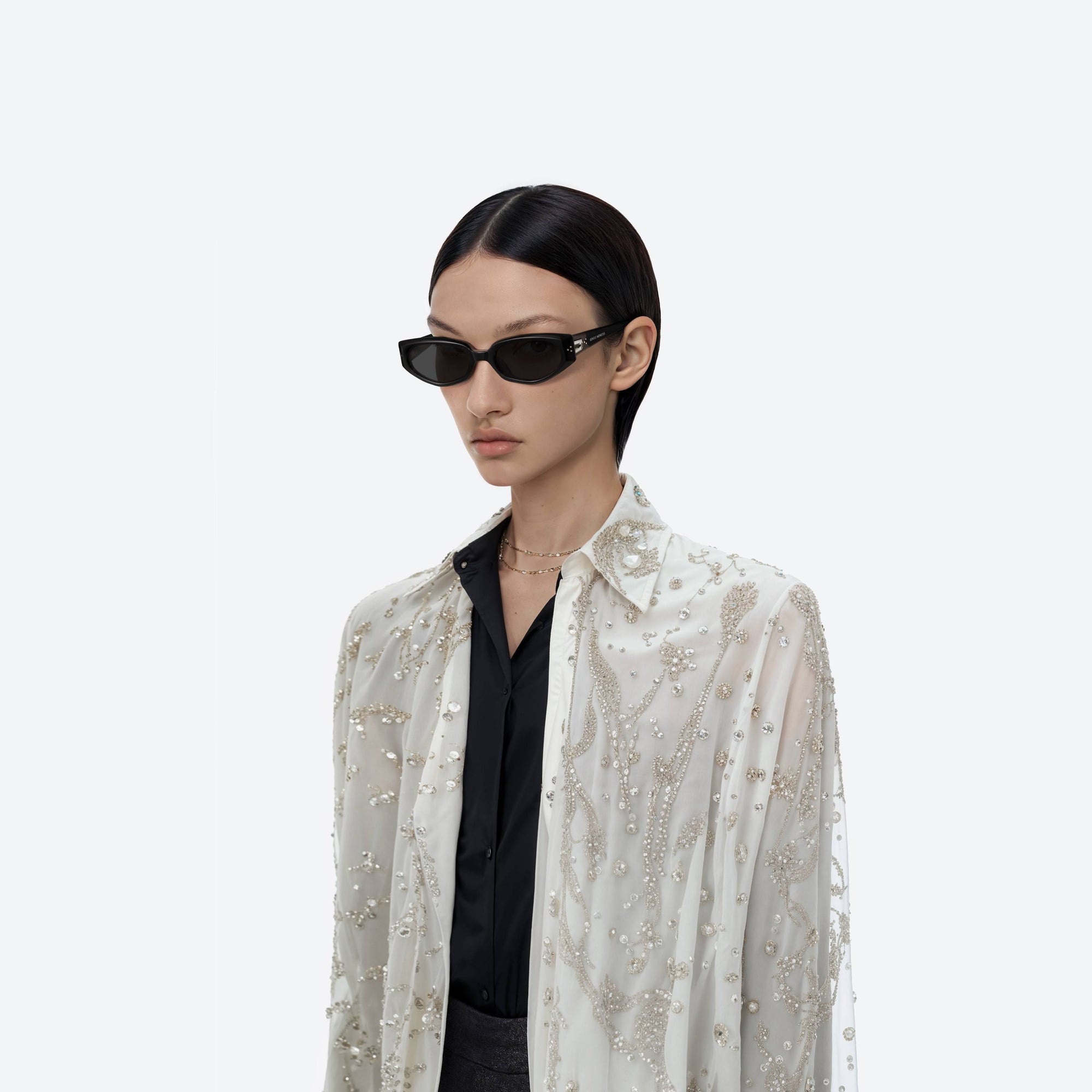 Model wearing the Devon 01 Black Acetate framed Cat-eye sunglasses.