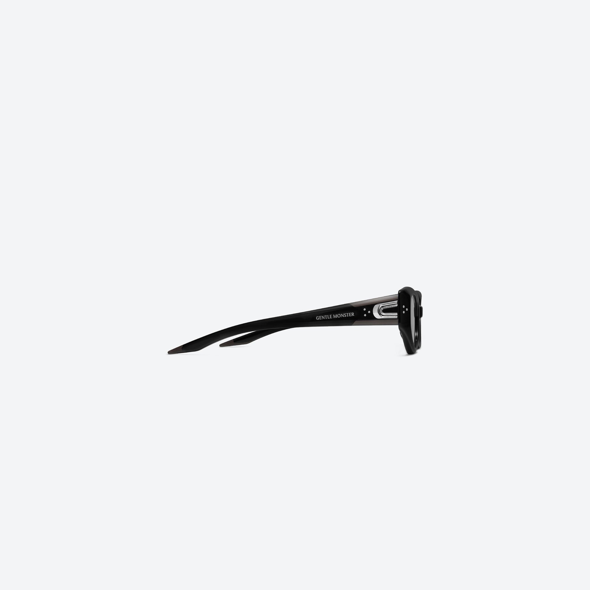 A detailed right view of Gentle Monster Devon 01 Black Acetate framed Cat-eye sunglasses.