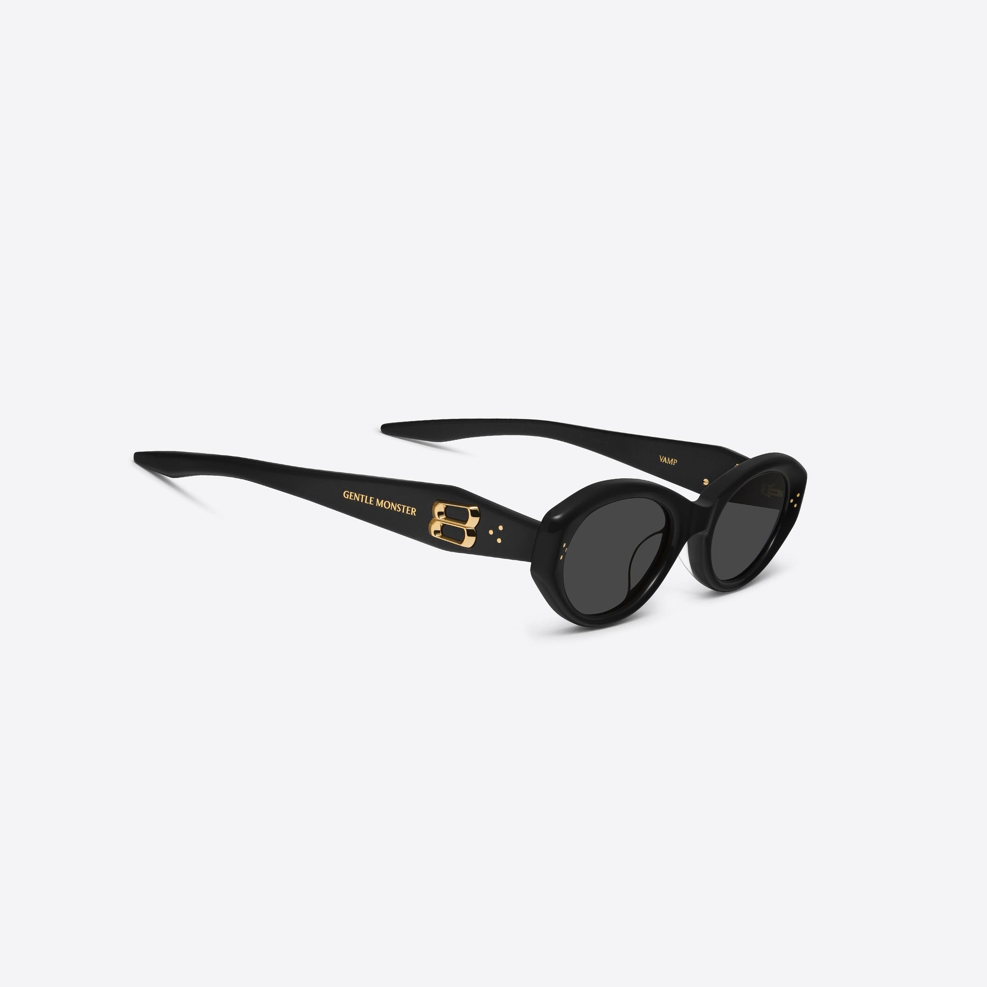 45-degree detailed view of Gentle Monster Vamp 01 Black Acetate framed Oval sunglasses.