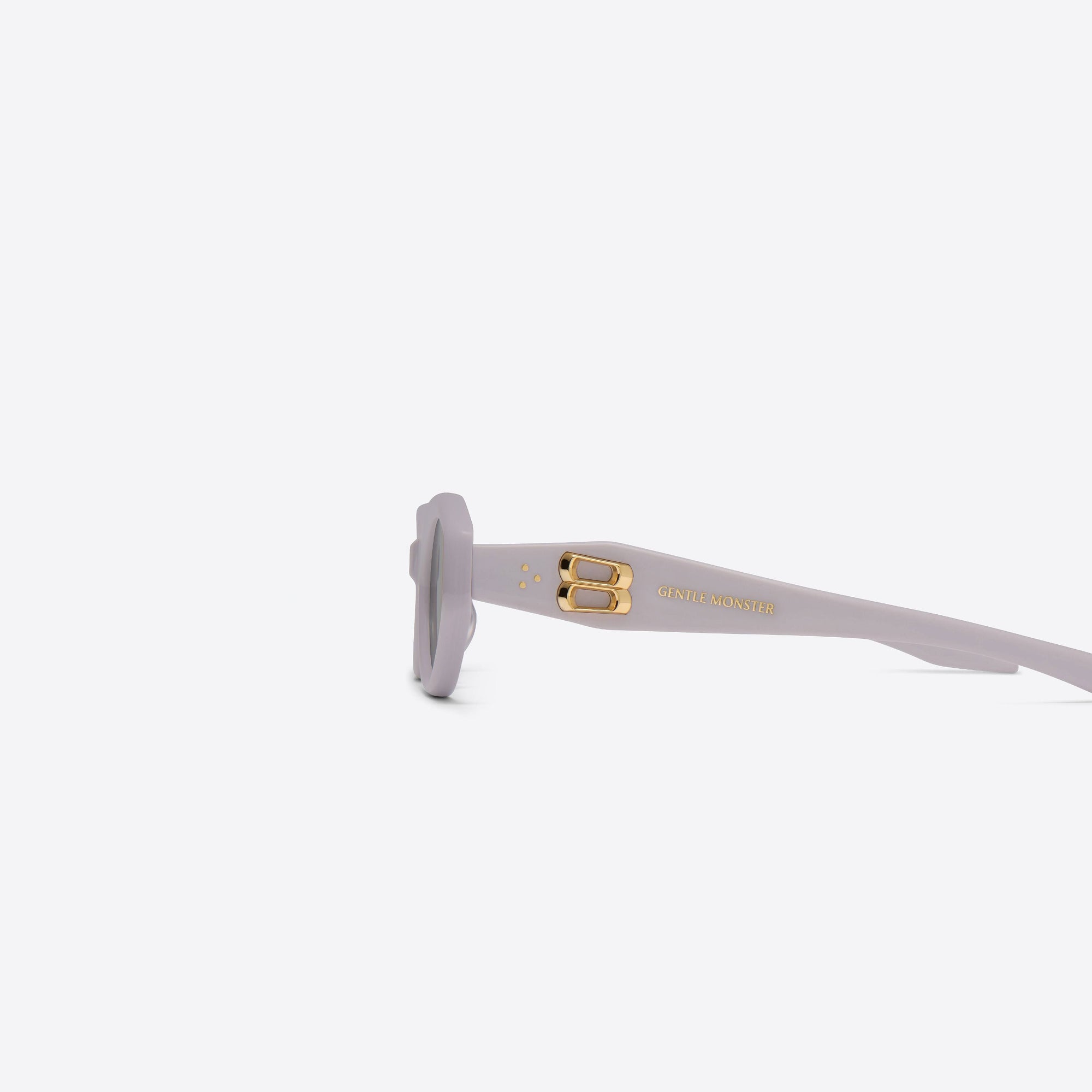 A detailed left view of Gentle Monster Vamp V4 Purple Acetate framed Oval sunglasses.