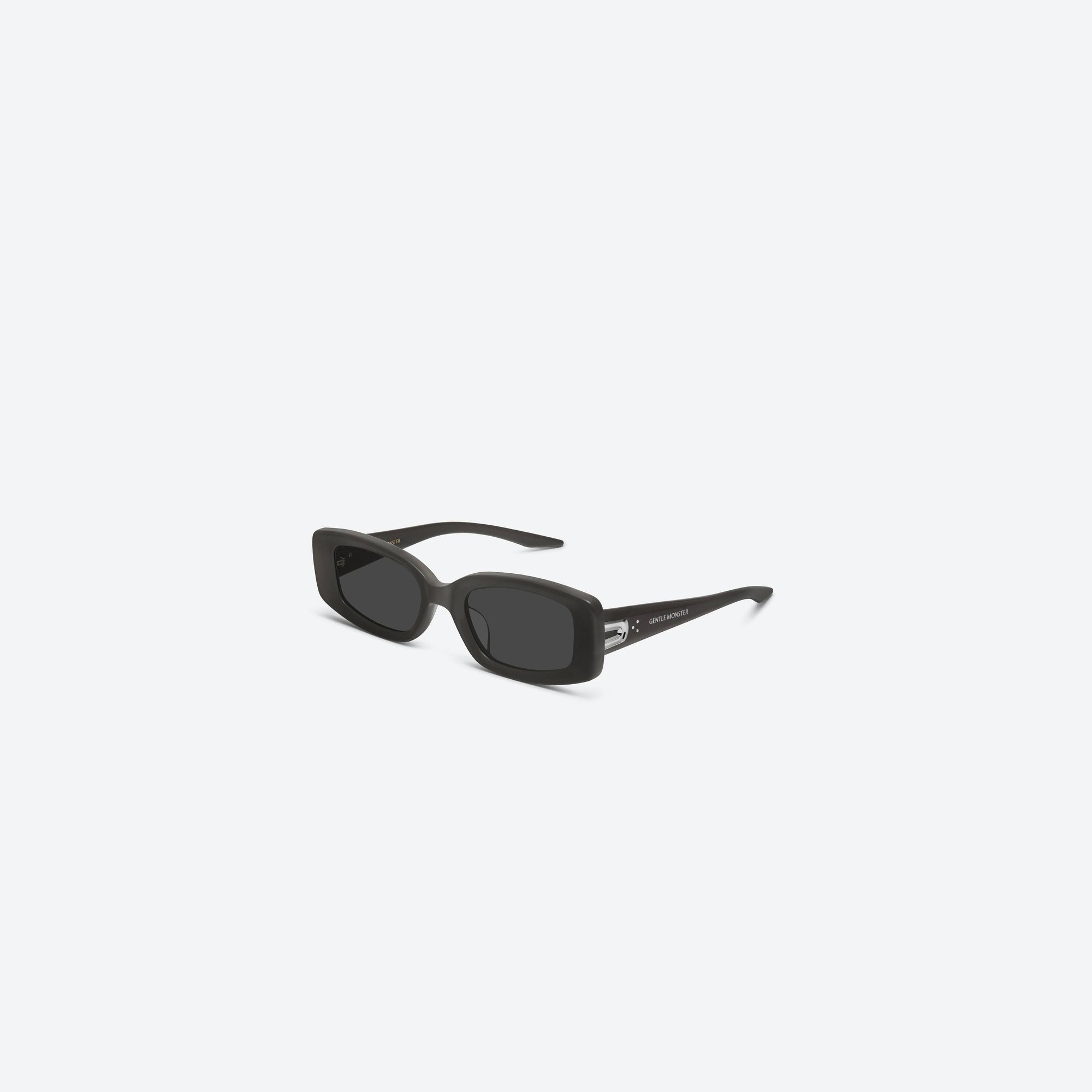 45-degree view of Gentle Monster Ash G15 Gray Acetate framed Square sunglasses.