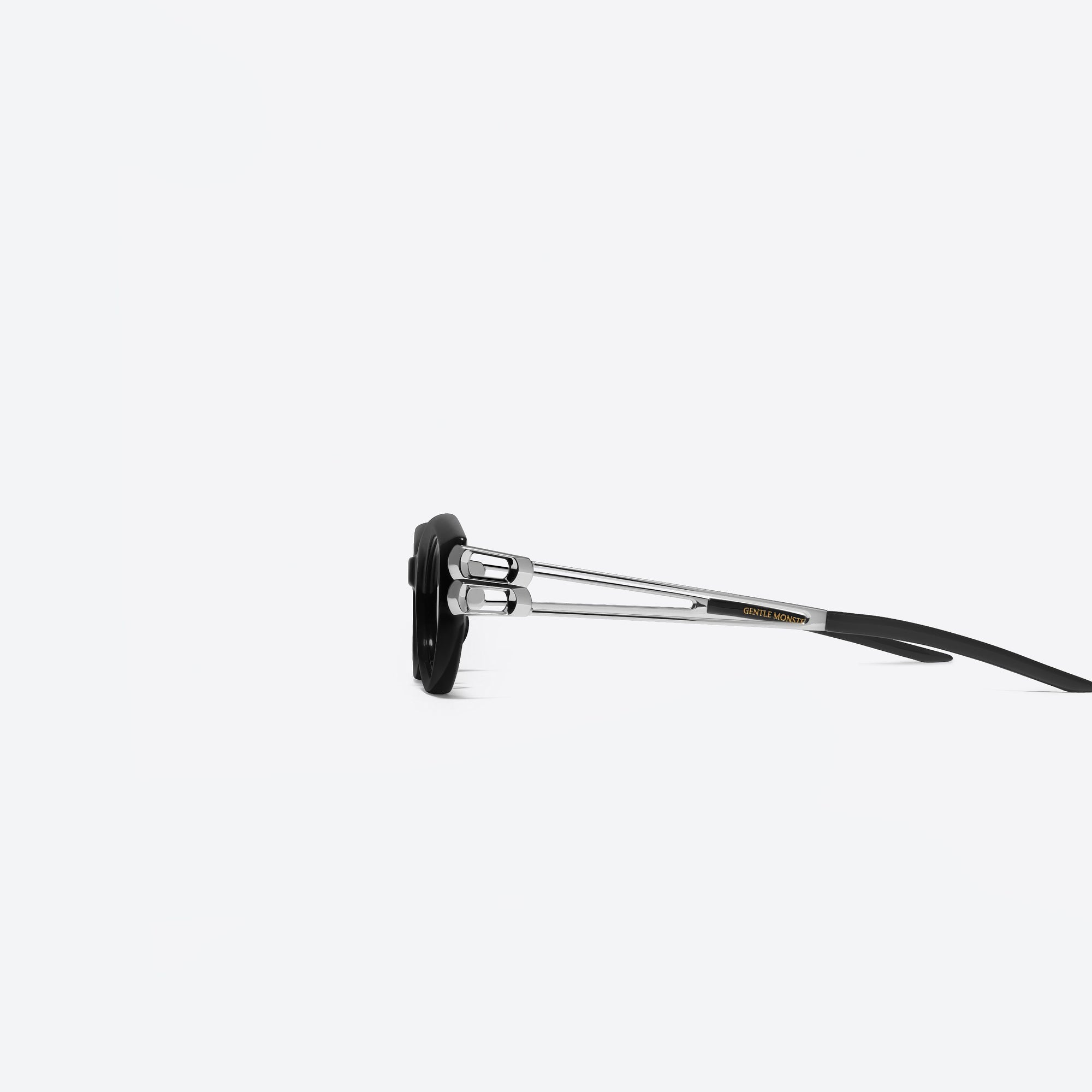 A detailed left view of Gentle Monster Kunst 01 Black Mixed framed Cat-eye sunglasses.