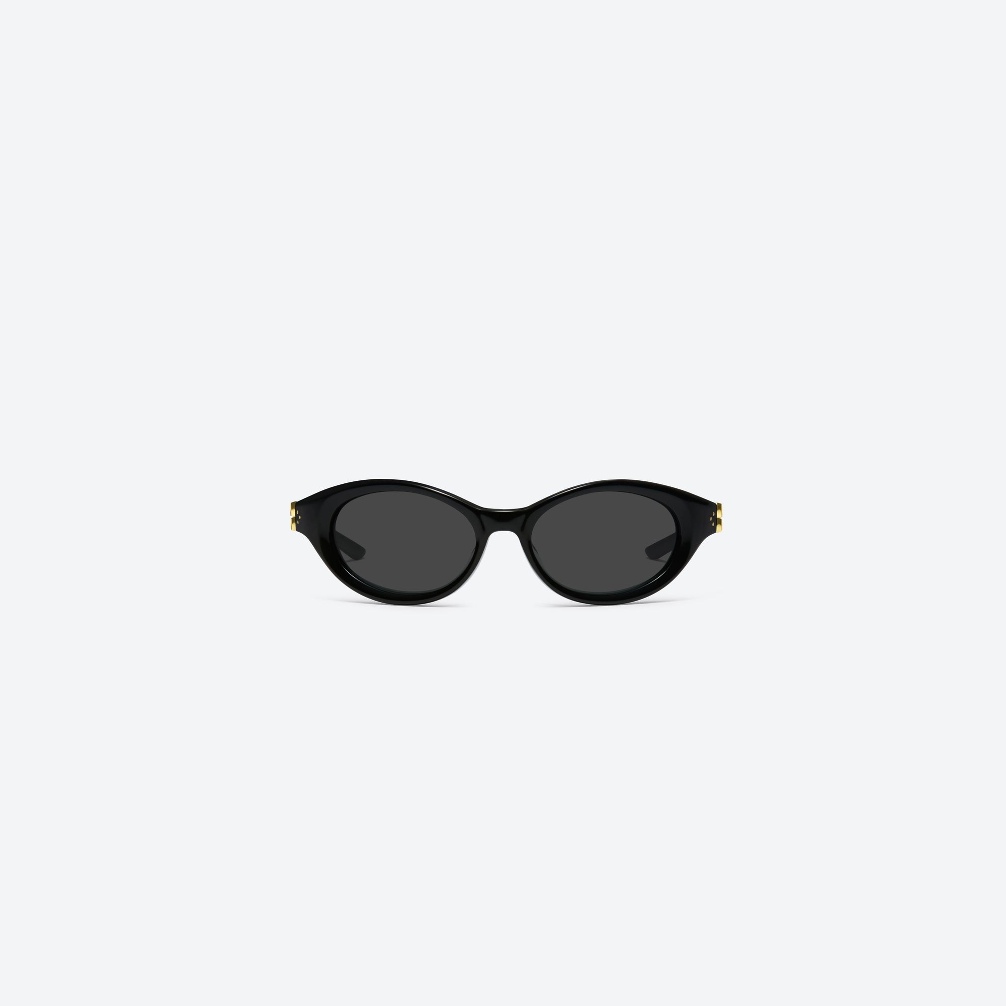 A front view of Gentle Monster Ion 01 Black Acetate framed Wraparound sunglasses.