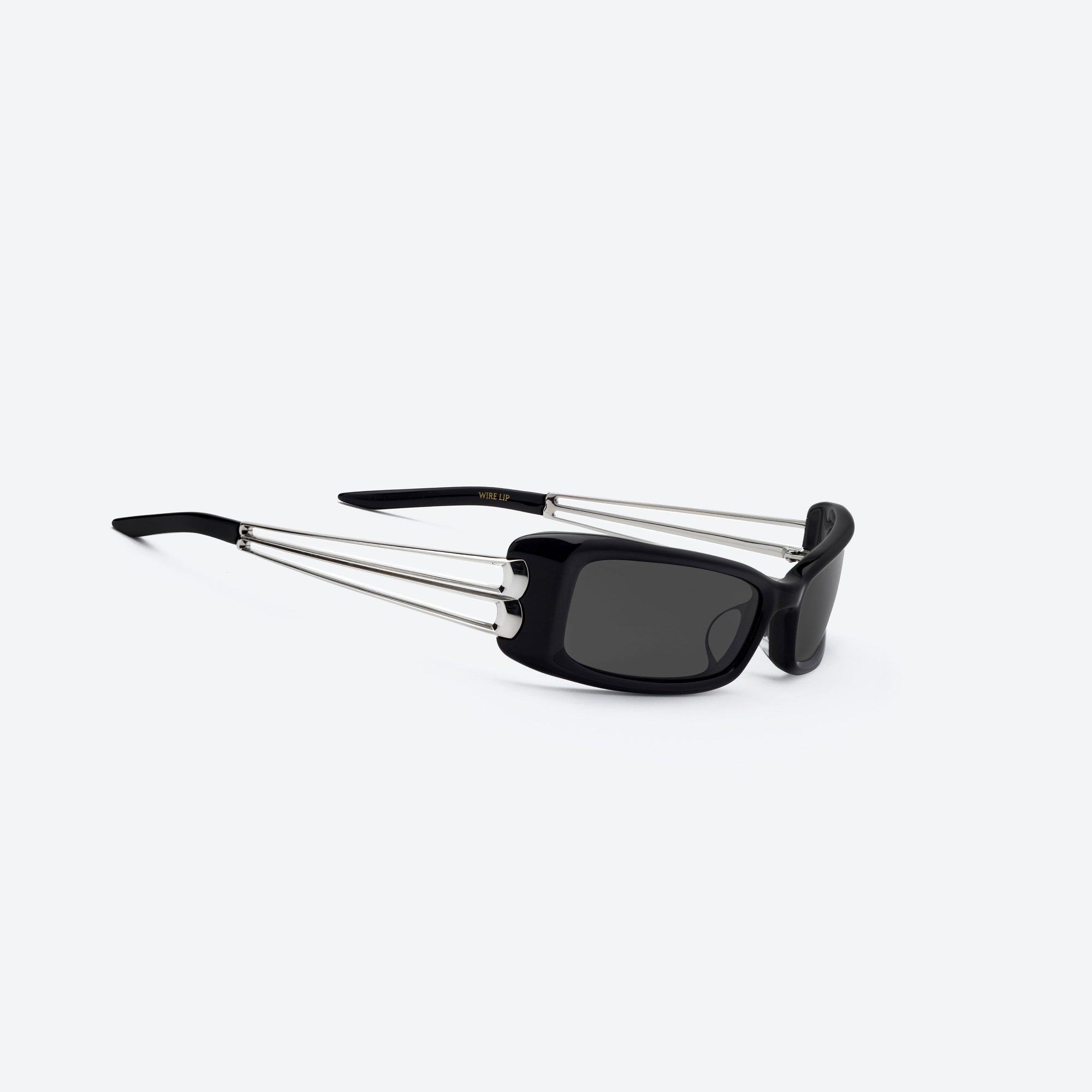 45-degree detailed view of Gentle Monster Wire Lip 01 Black Mixed framed Square sunglasses.